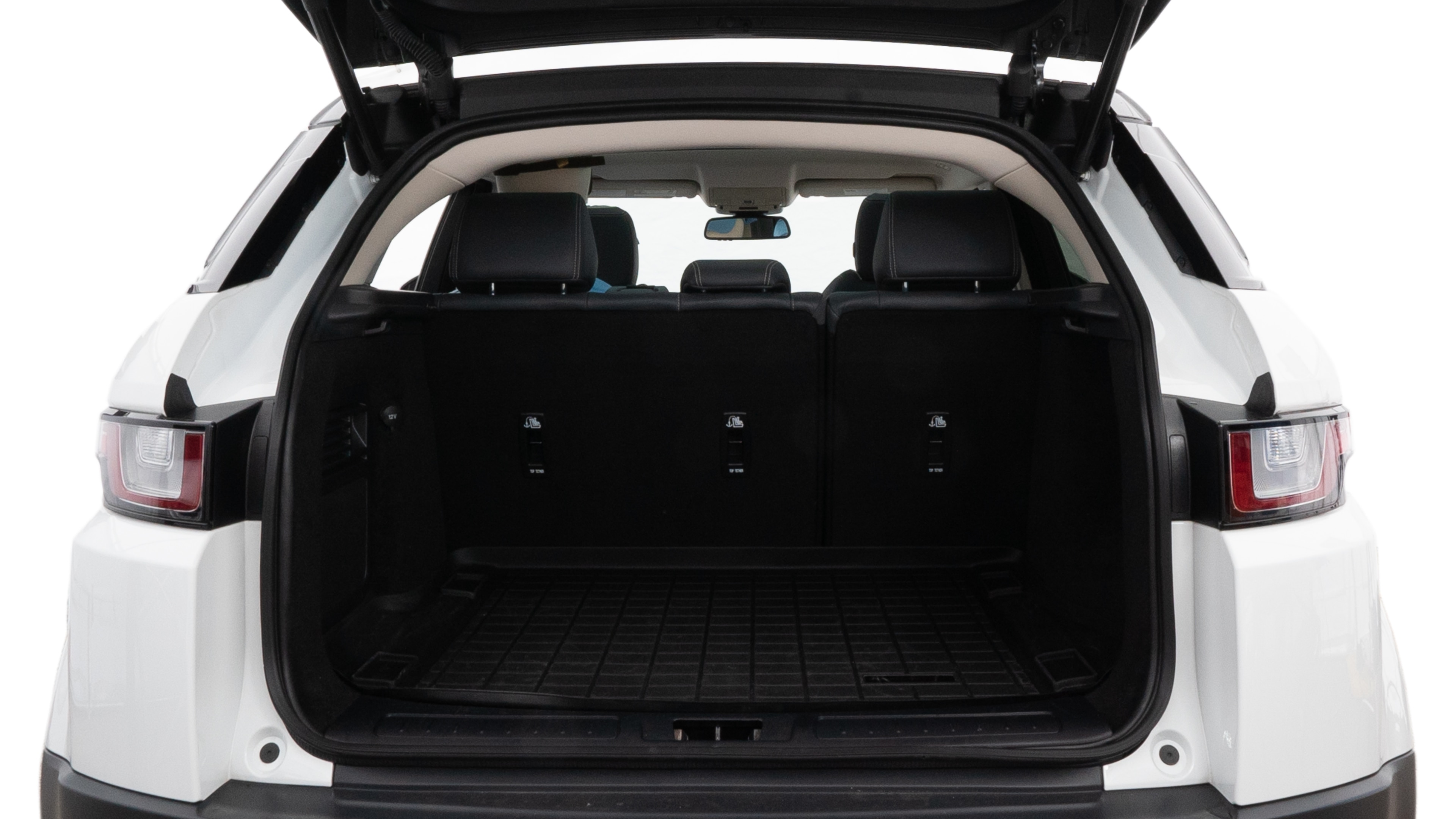The trunk lid is open showing full view of the trunk. A baby stroller, three grocery carriers, two camping chairs in the carrying bag, and a set of golf clubs are placed inside.