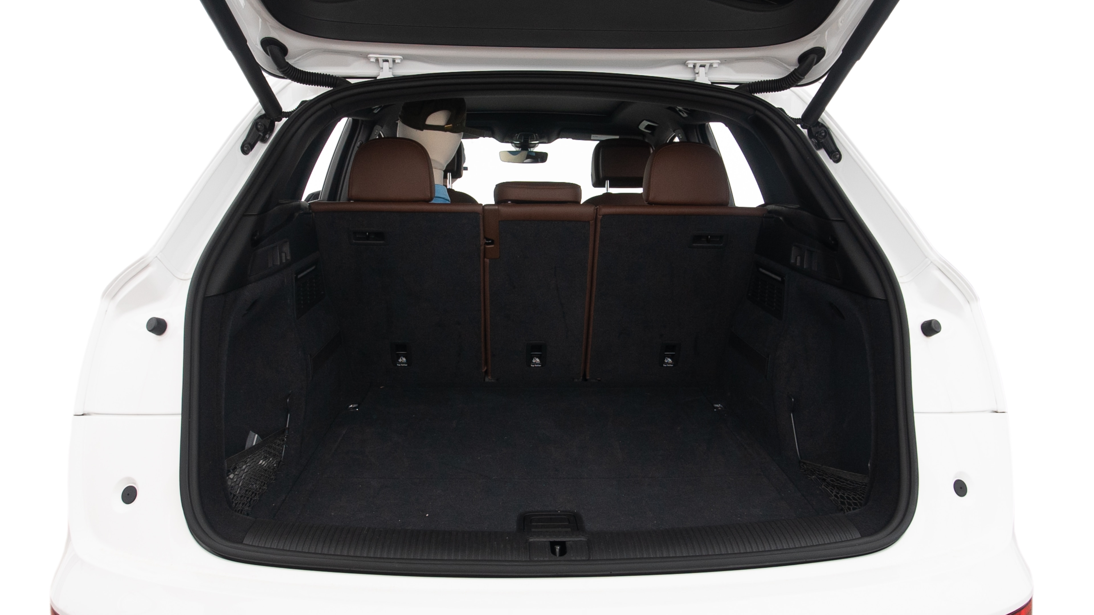 The trunk lid is open showing full view of the trunk. A baby stroller, three grocery carriers, two camping chairs in the carrying bag, and a set of golf clubs are placed inside.