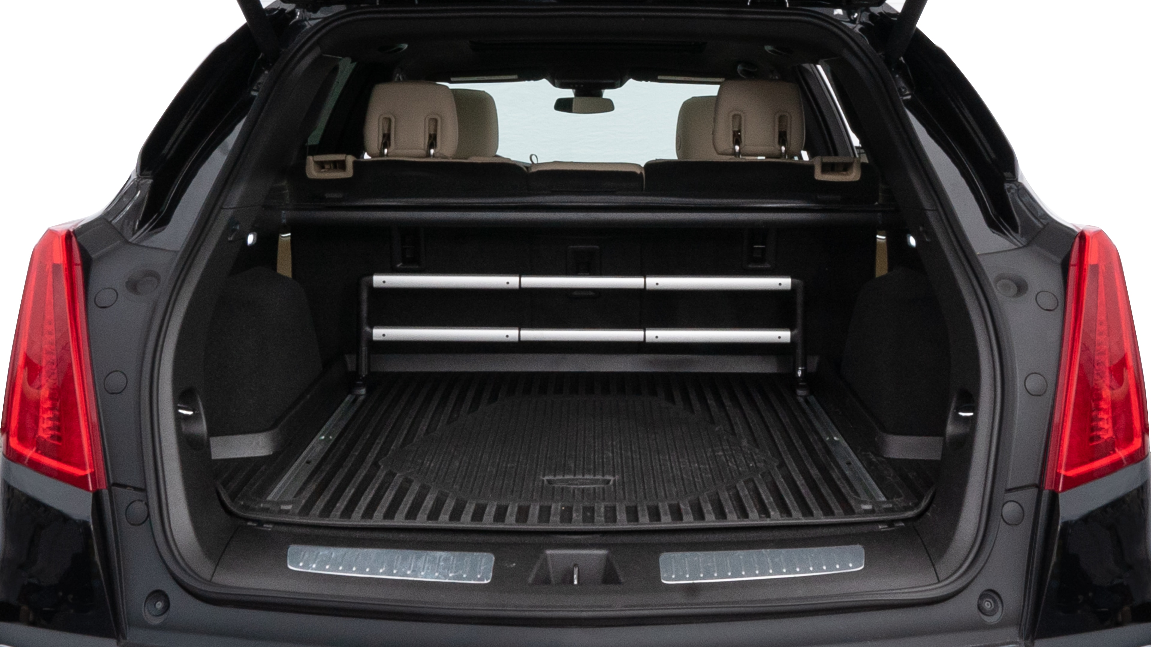 The trunk lid is open showing full view of the trunk. A baby stroller, three grocery carriers, two camping chairs in the carrying bag, and a set of golf clubs are placed inside.