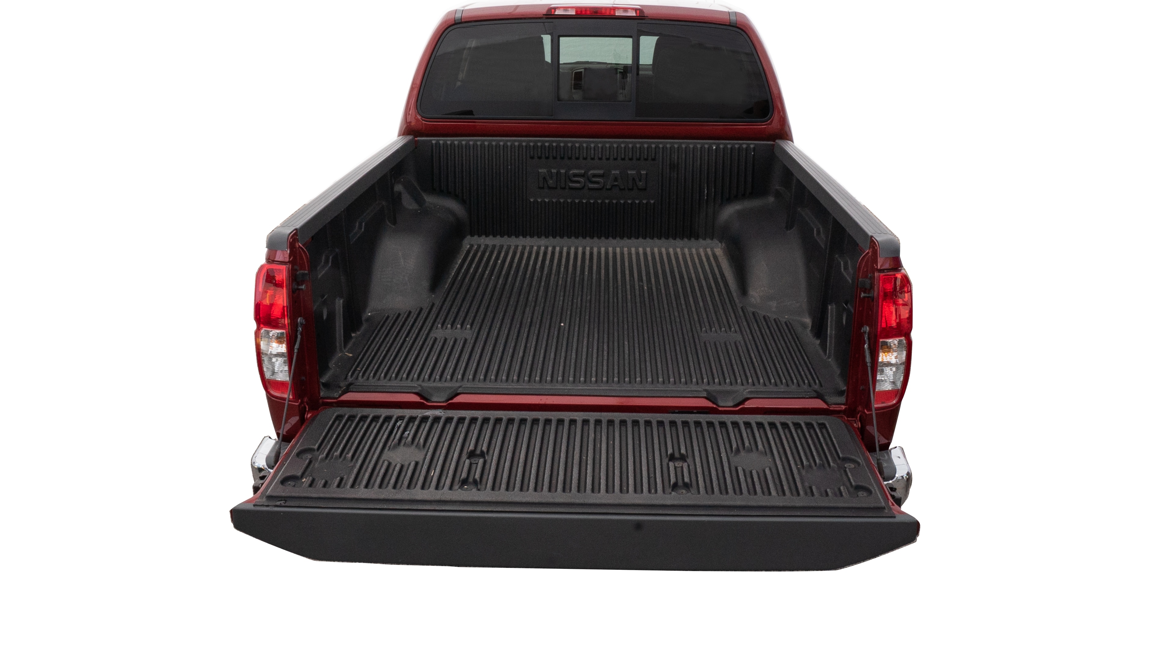 The trunk area is open giving a full view of the trunk area. A cooler, two camping chairs, a tailgate tent and a kayak are placed inside. 