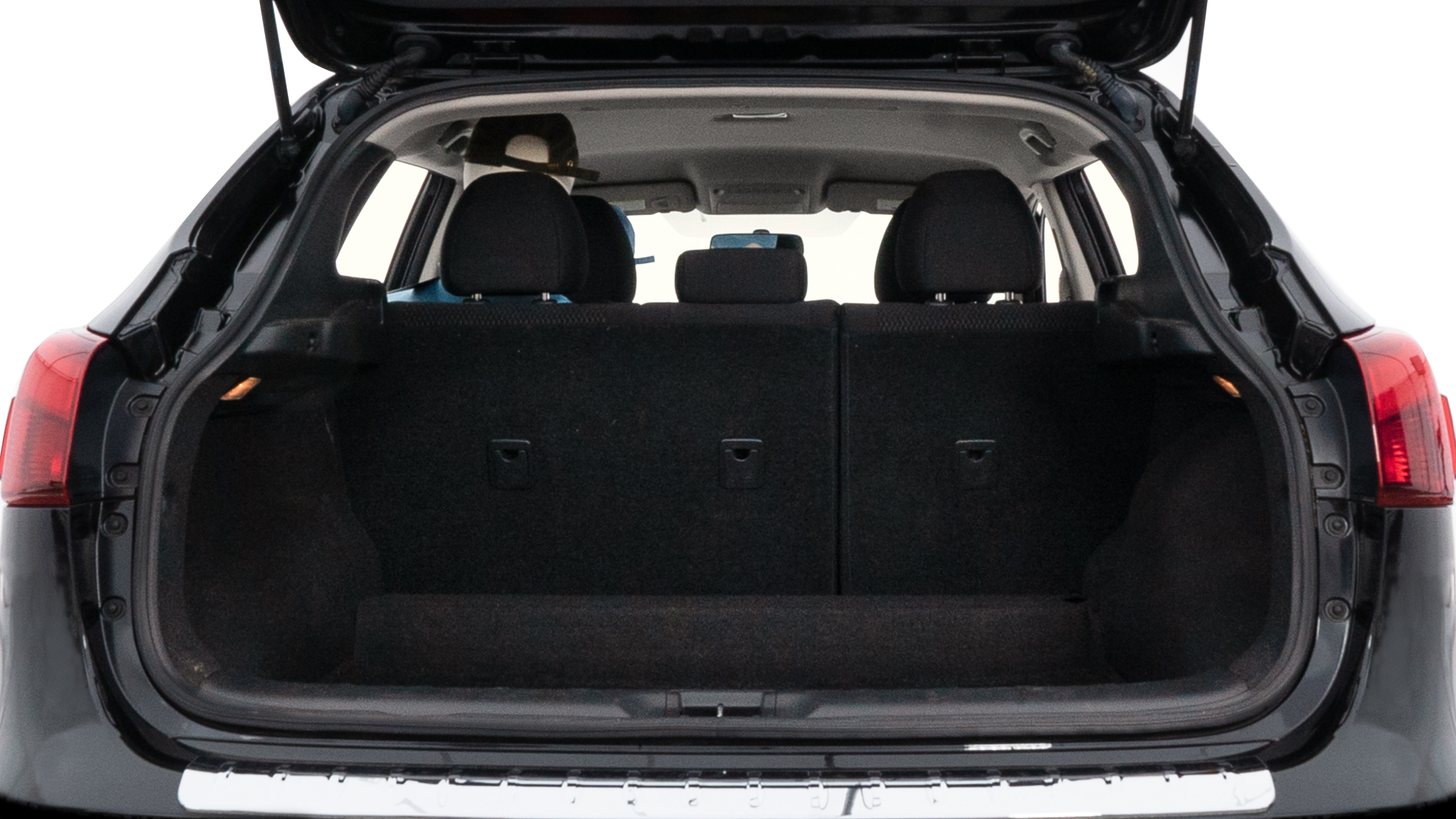 The trunk lid is open showing full view of the trunk. A baby stroller, three grocery carriers, two camping chairs in the carrying bag, and a set of golf clubs are placed inside.