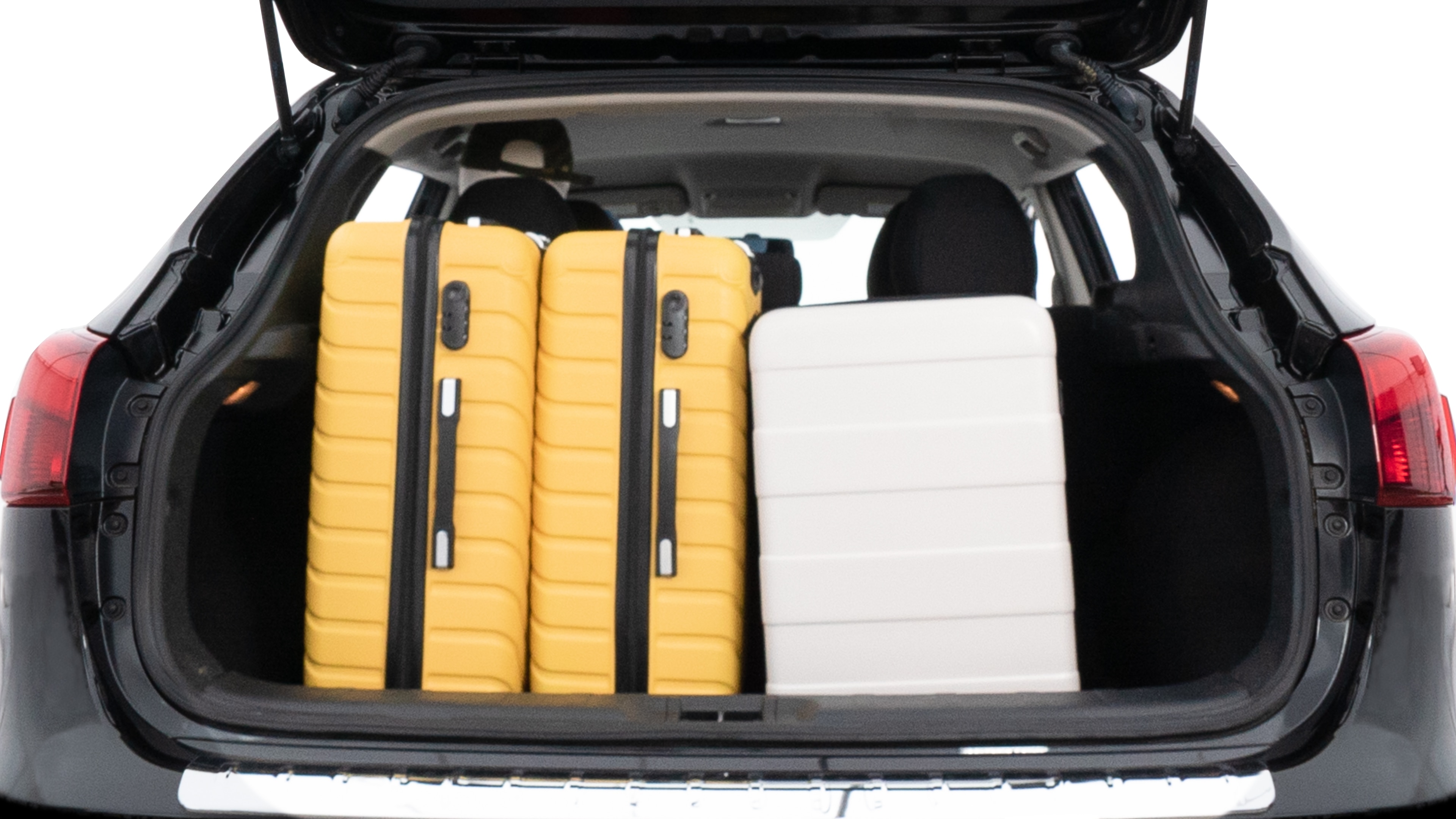 The trunk lid is open, showing full view of the trunk space. Two medium and two small suitcases are placed inside.