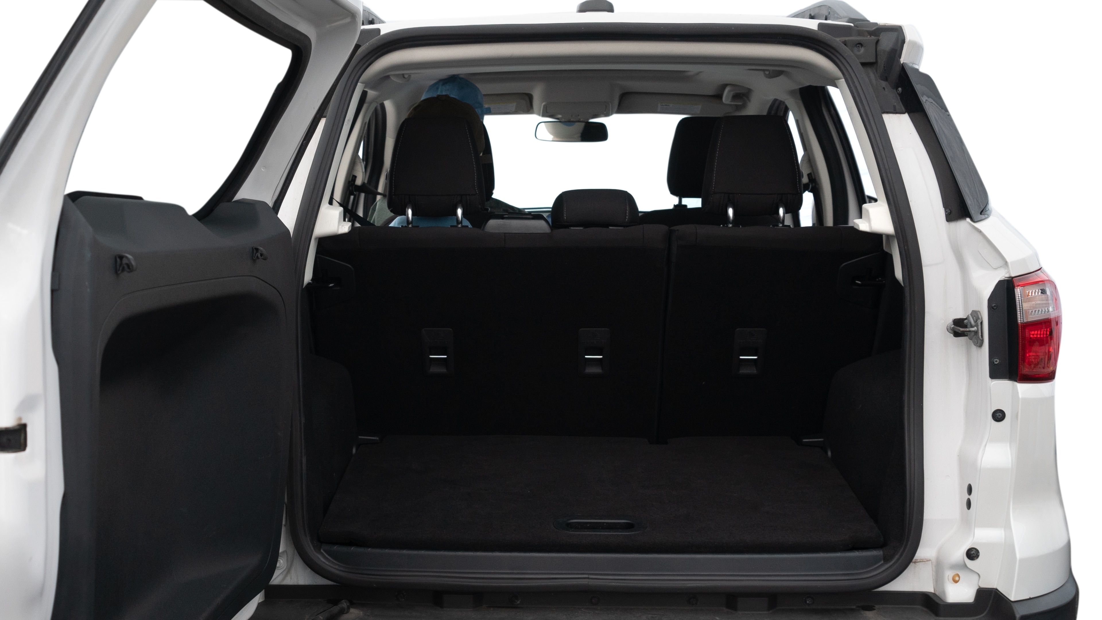 The trunk lid is open showing full view of the trunk. A baby stroller, three grocery carriers, two camping chairs in the carrying bag, and a set of golf clubs are placed inside.