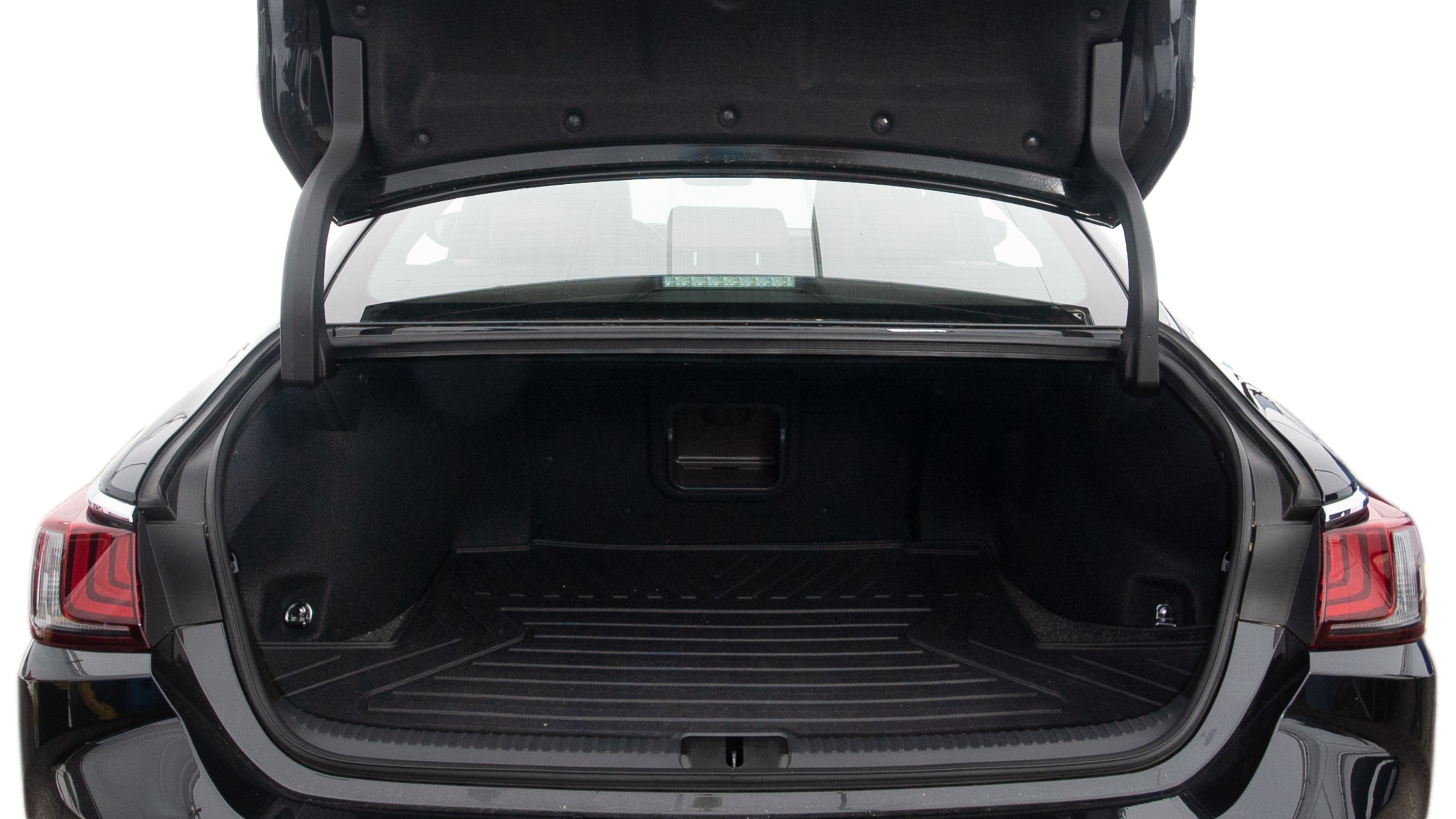 The trunk lid is open showing full view of the trunk. A baby stroller, three grocery carriers, two camping chairs in the carrying bag, and a set of golf clubs are placed inside.