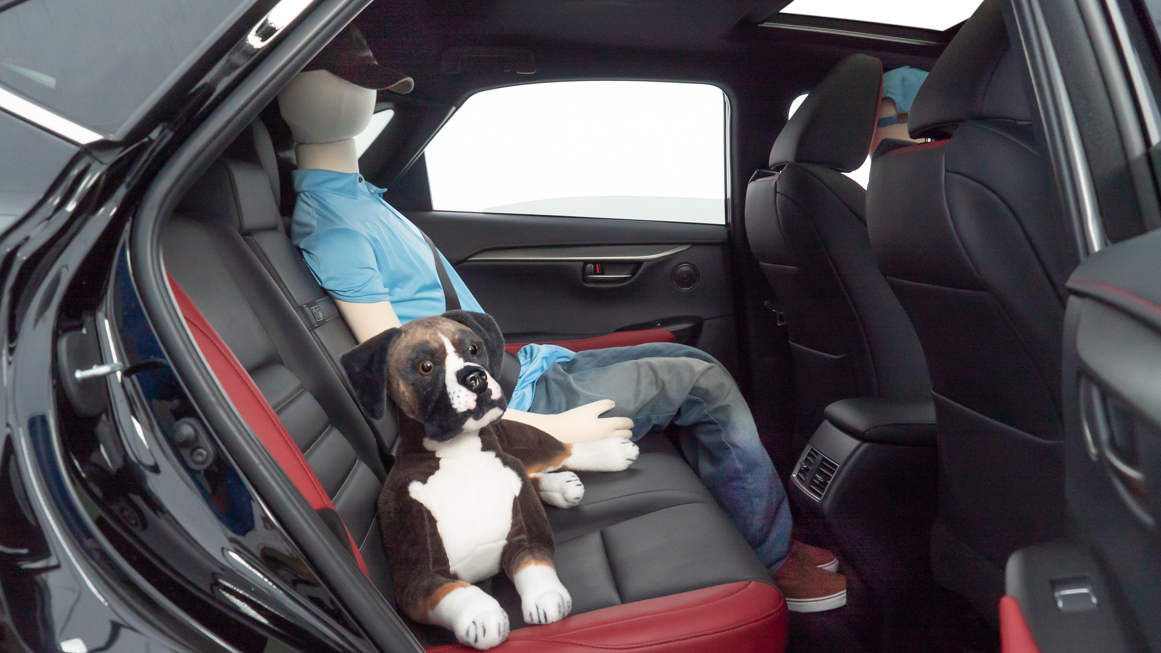 A series of second-row backseat photos is shown including one seating a baby seat and one seating a 6'1" mannequin