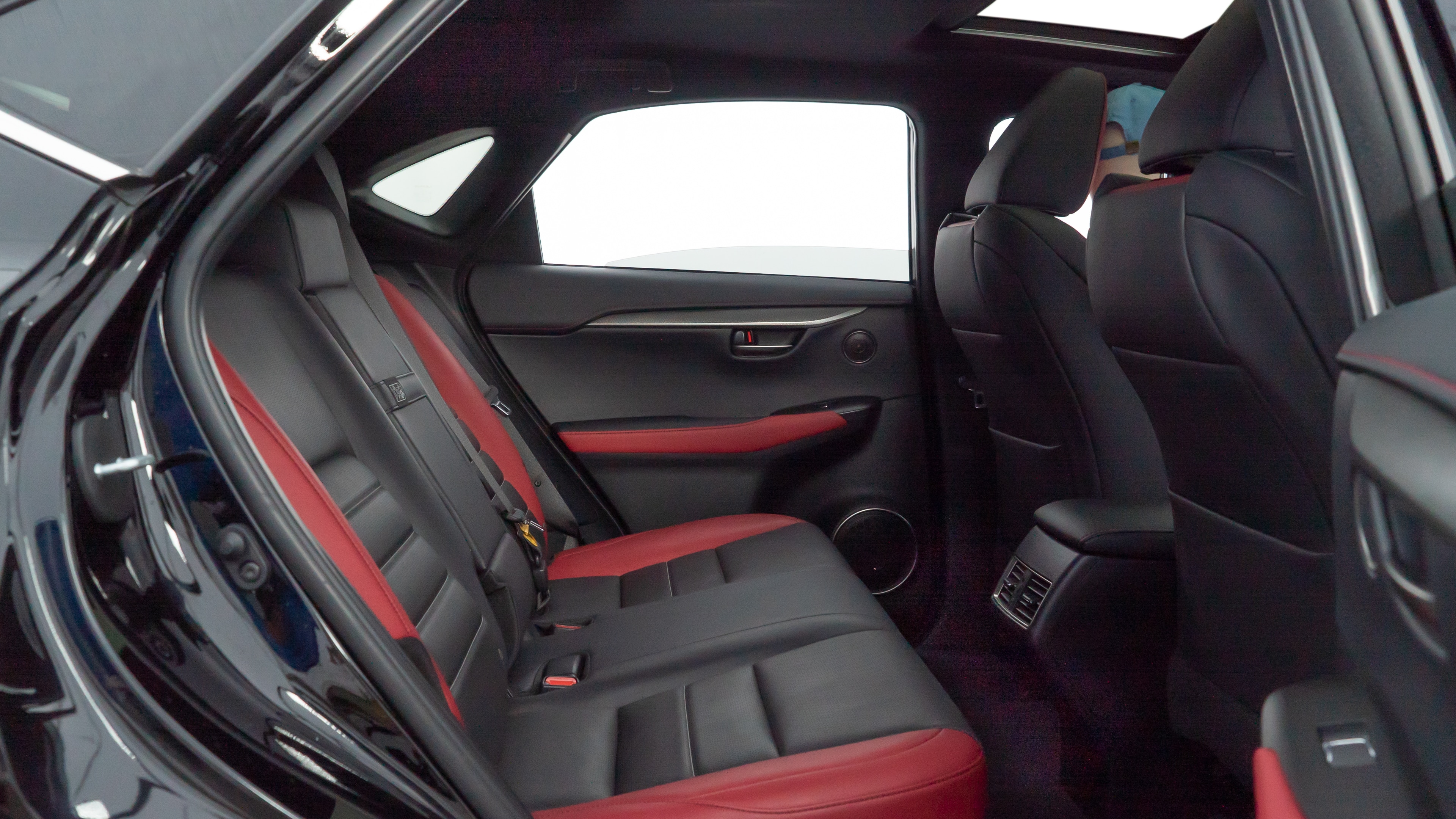 A series of second-row backseat photos is shown including one seating a baby seat and one seating a 6'1" mannequin