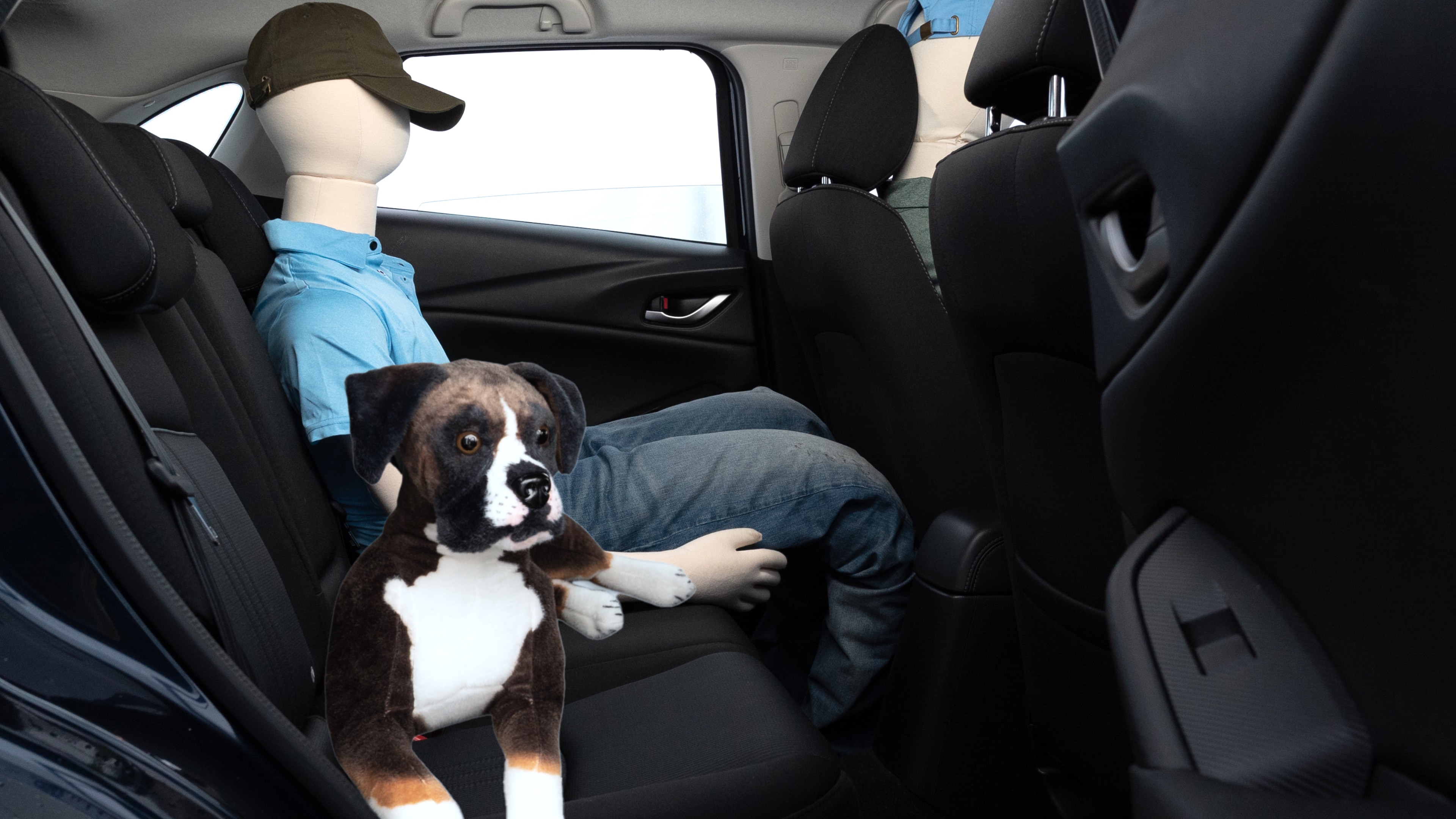 A series of second-row backseat photos is shown including one seating a baby seat and one seating a 6'1" mannequin.