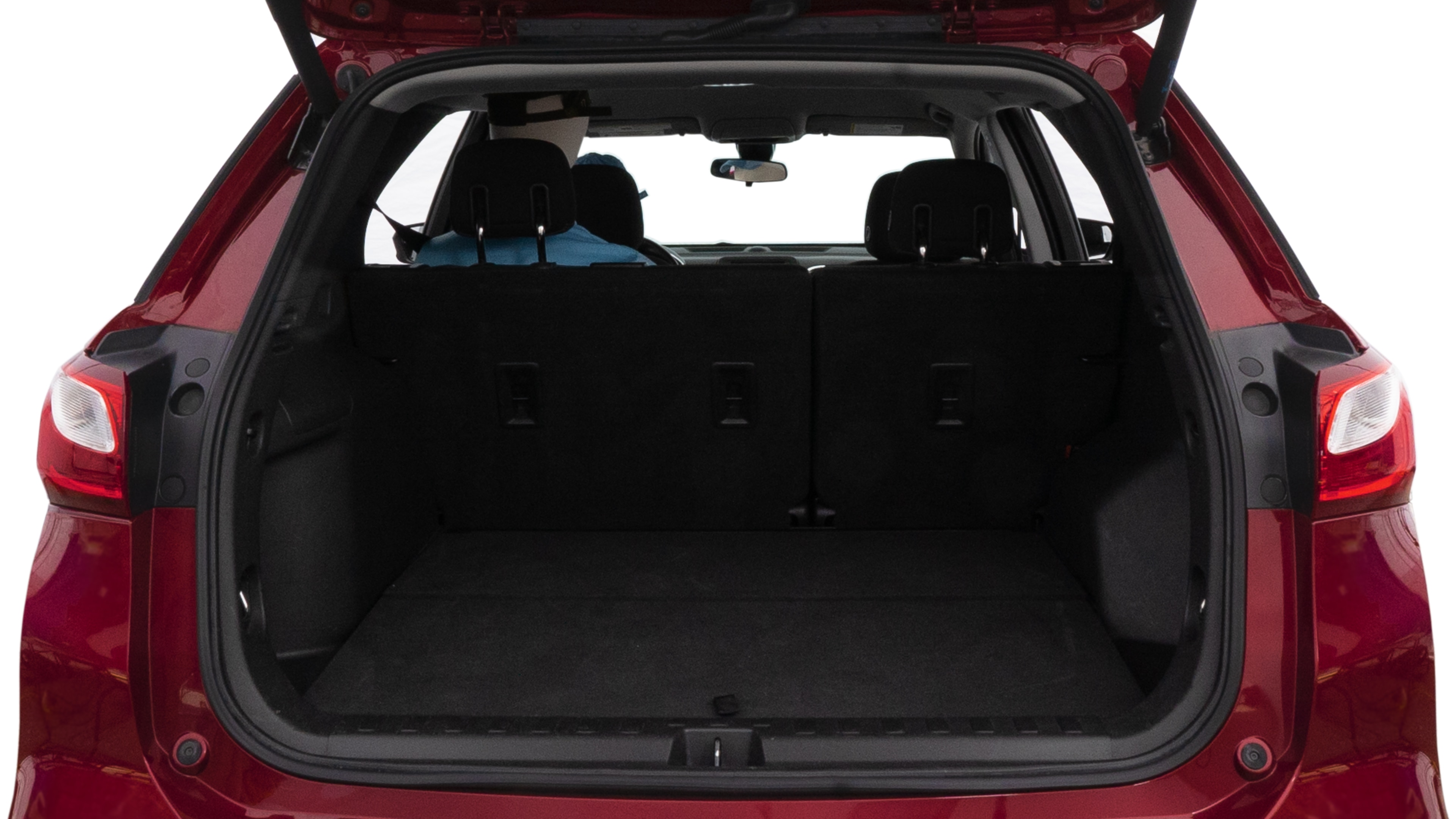 The trunk lid is open showing full view of the trunk. A baby stroller, three grocery carriers, two camping chairs in the carrying bag, and a set of golf clubs are placed inside.