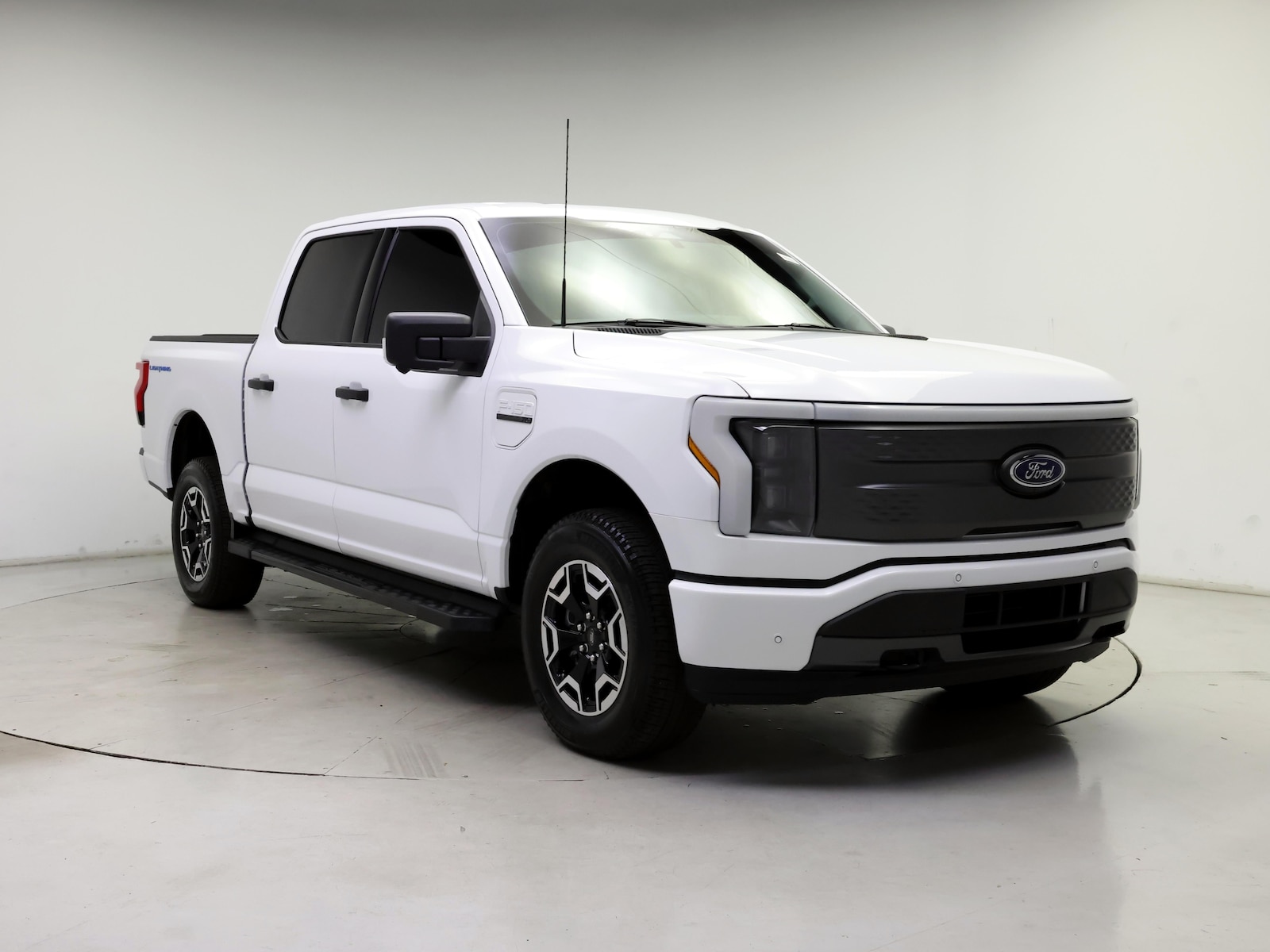Used 2022 Ford F-150 Lightning XLT with VIN 1FTVW1ELXNWG16628 for sale in Kenosha, WI