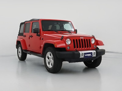 Red 2015 Jeep Wrangler Unlimited Sahara