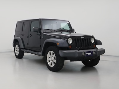 Black 2013 Jeep Wrangler Unlimited Sport