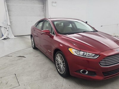 Red 2014 Ford Fusion Hybrid SE