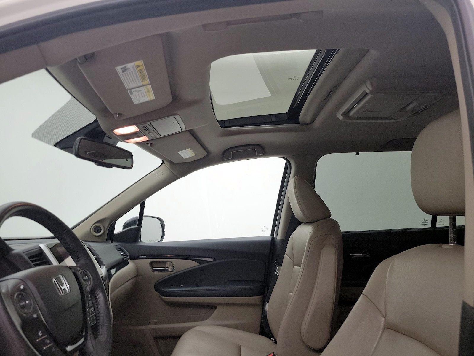 Sunroof(s) & Overhead Airbags
