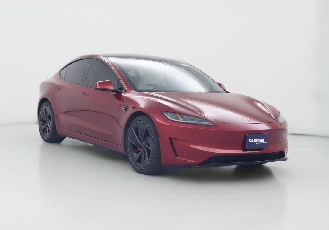 2025 Tesla Model 3 Performance All-Wheel Drive in Red — CarMax photo