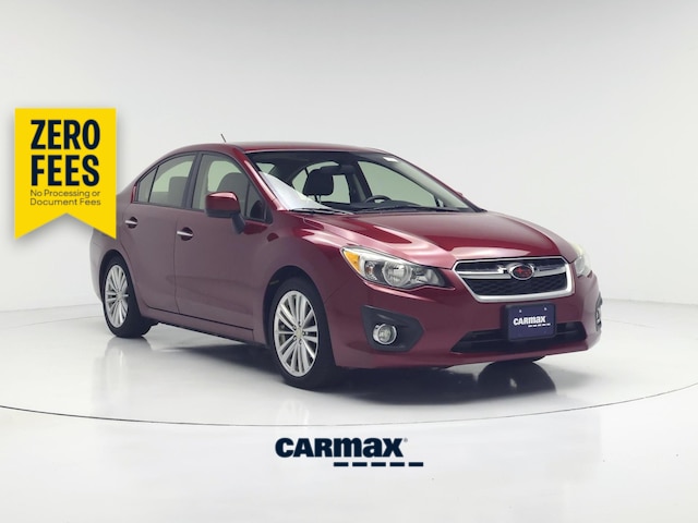 Red 2014 Subaru Impreza Sedan All-Wheel Drive Automatic