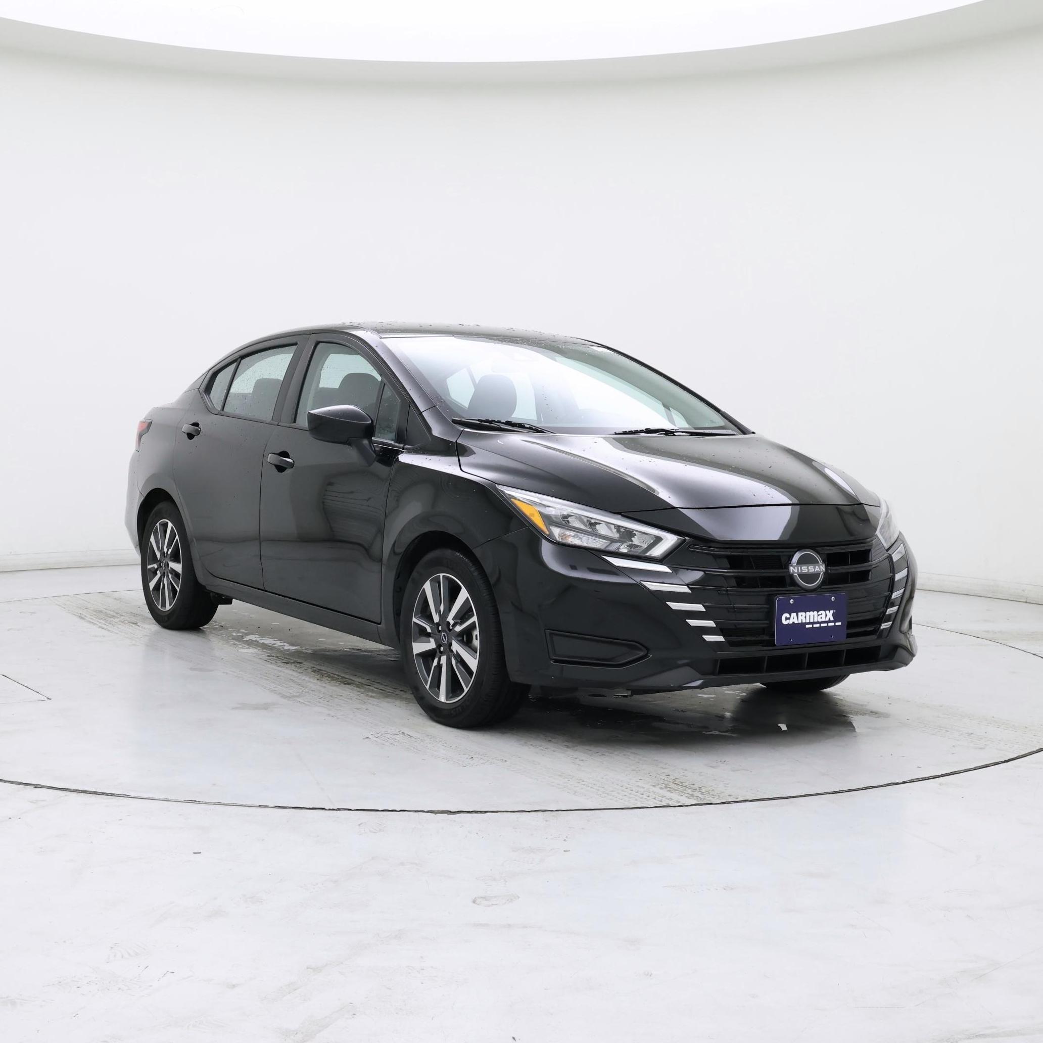 Black 2025 Nissan Versa SV FWD Sedan Front-Wheel Drive Automatic