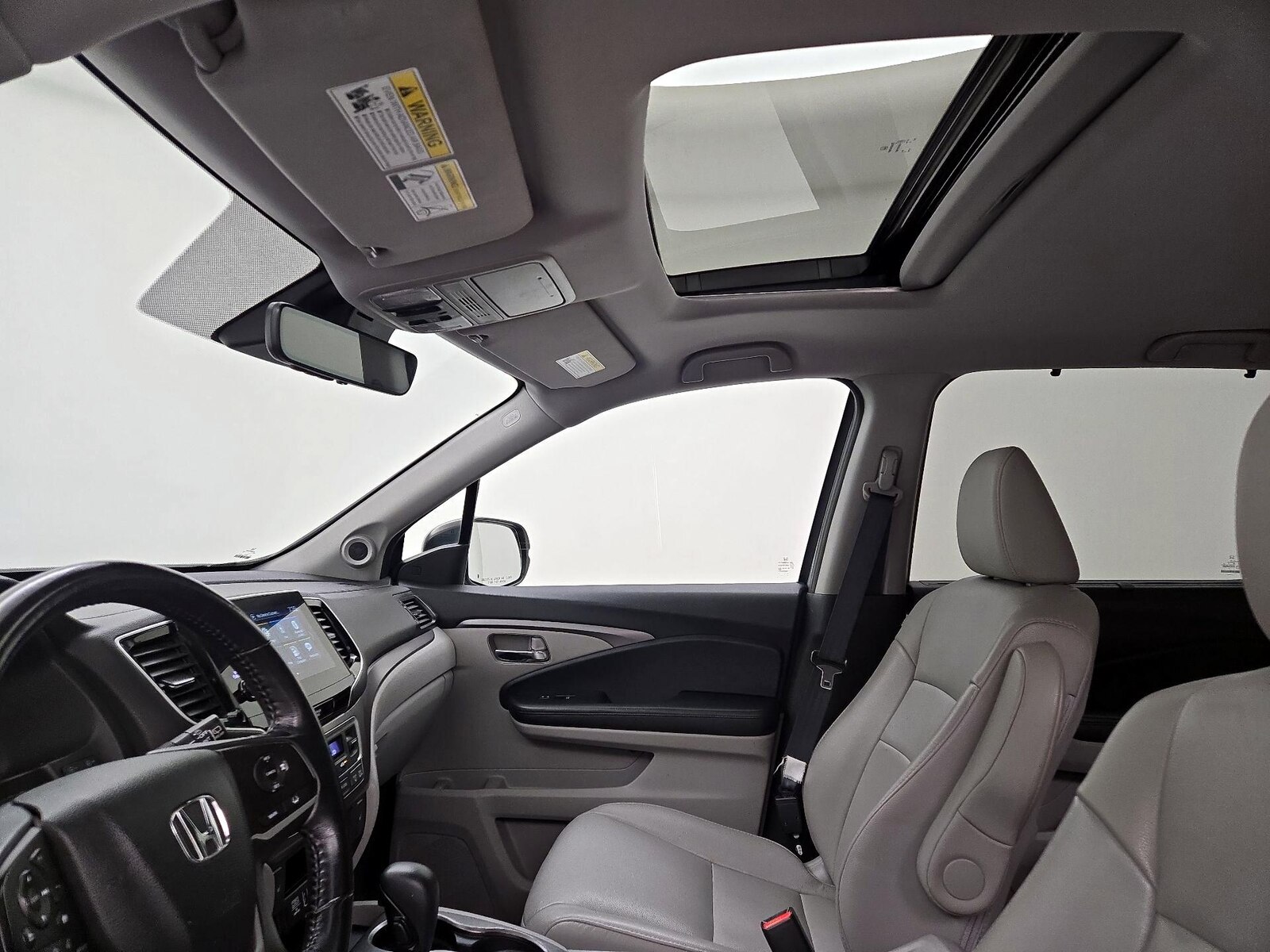 Sunroof(s) & Overhead Airbags