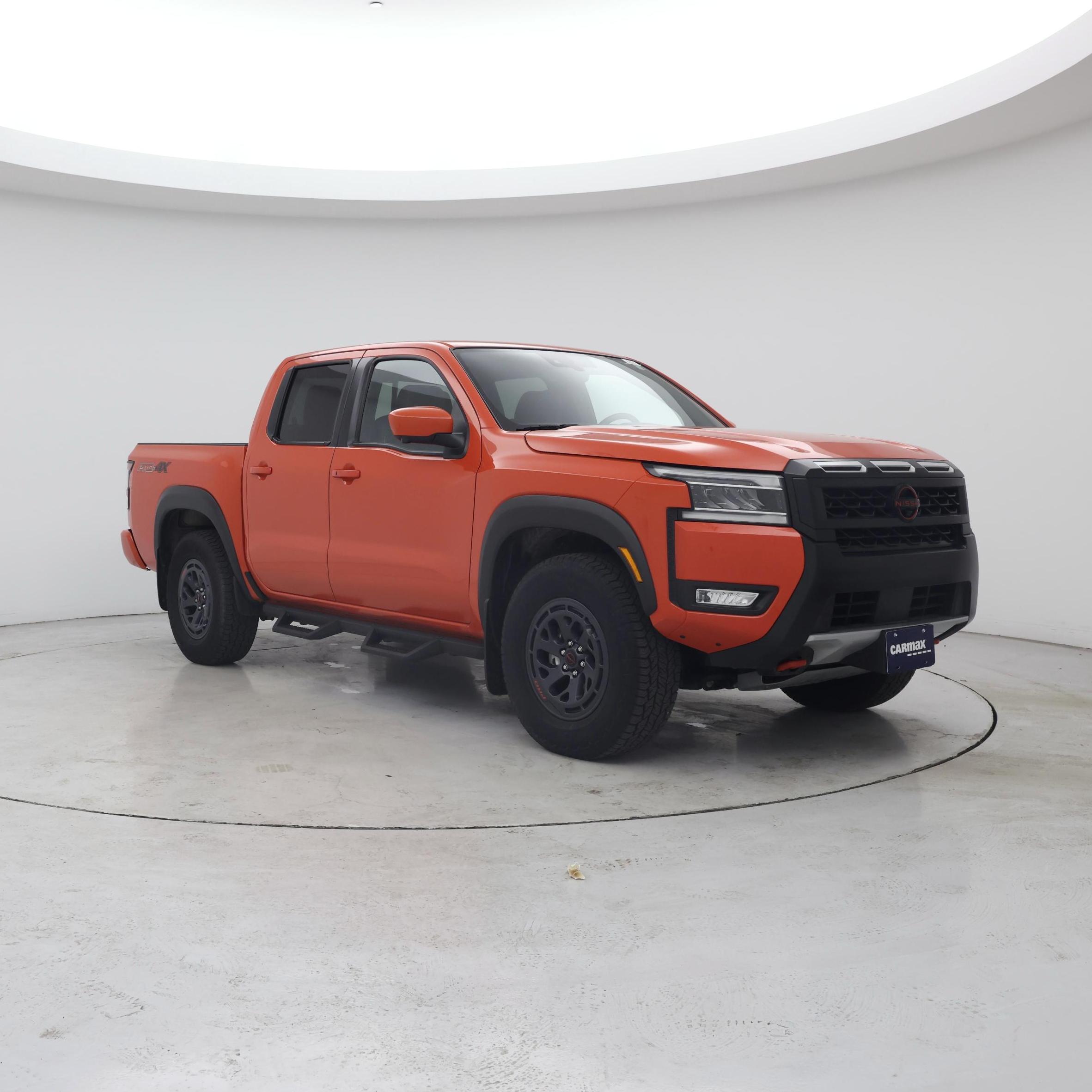 Orange 2025 Nissan Frontier Pickup Truck Four-Wheel Drive Automatic