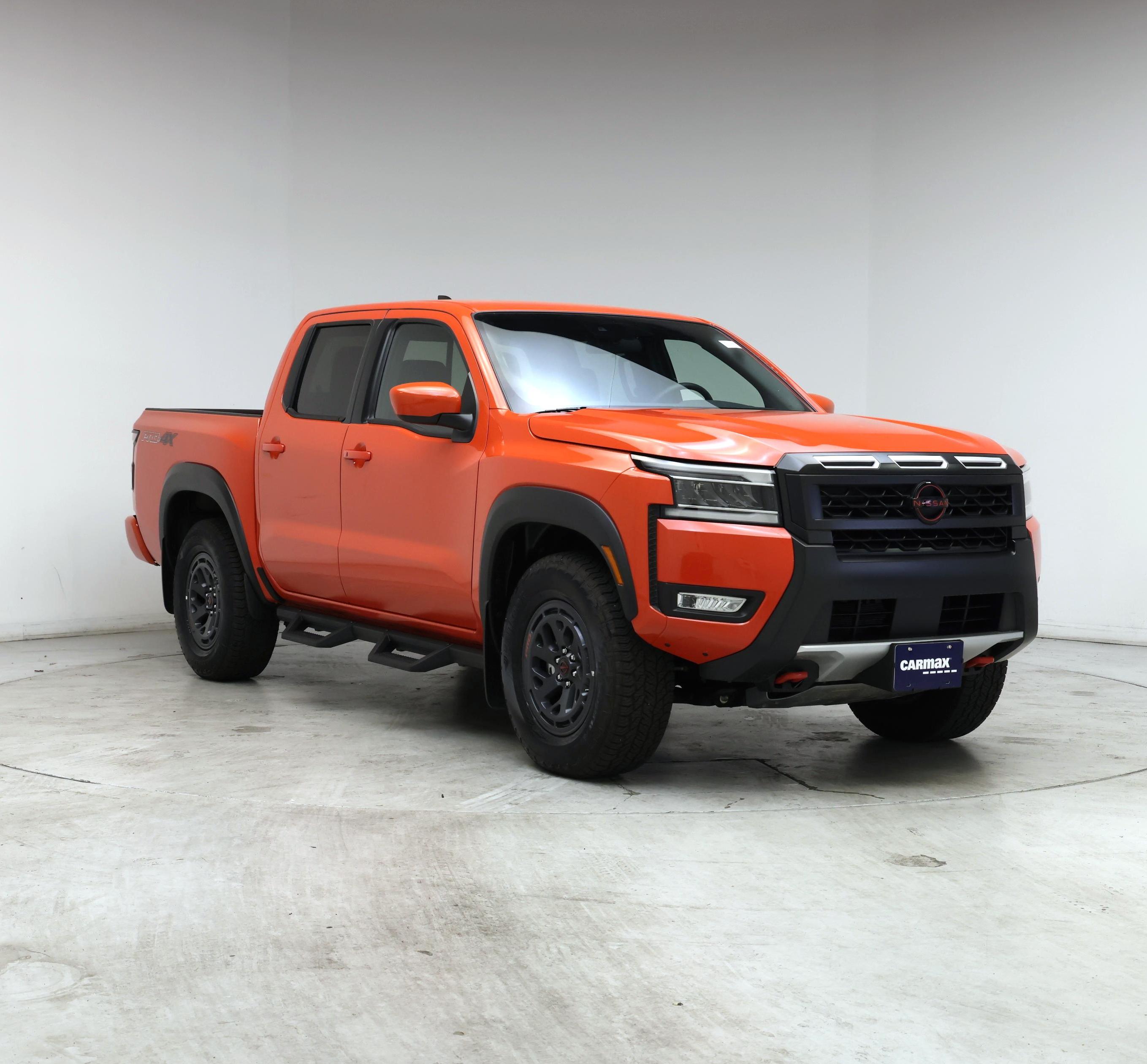 Orange 2025 Nissan Frontier Pickup Truck Four-Wheel Drive Automatic