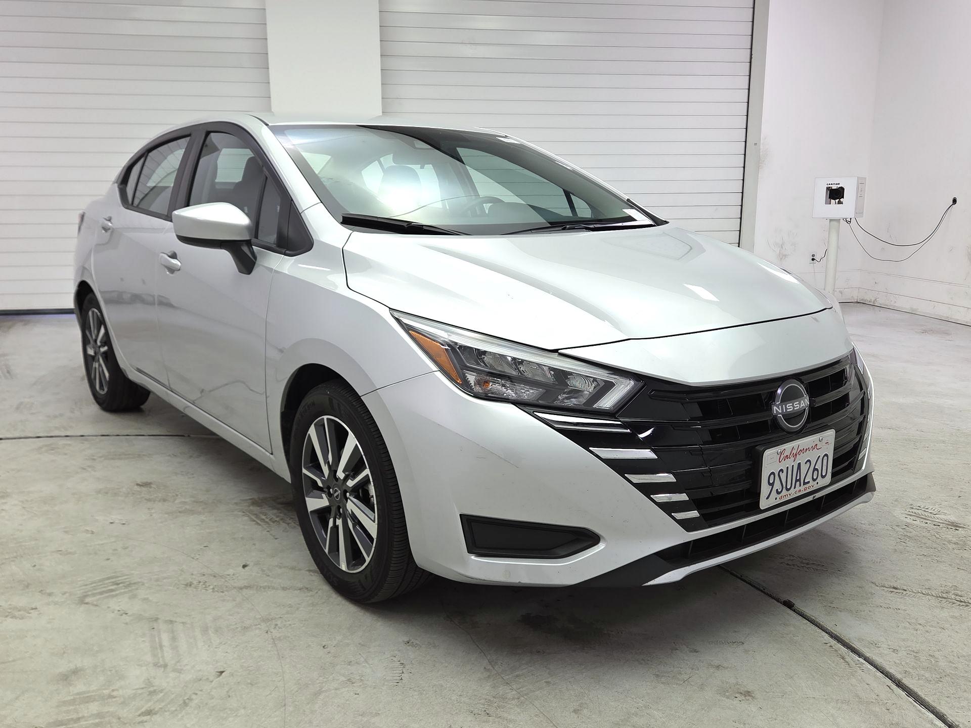 Silver 2025 Nissan Versa SV FWD Sedan Front-Wheel Drive Automatic
