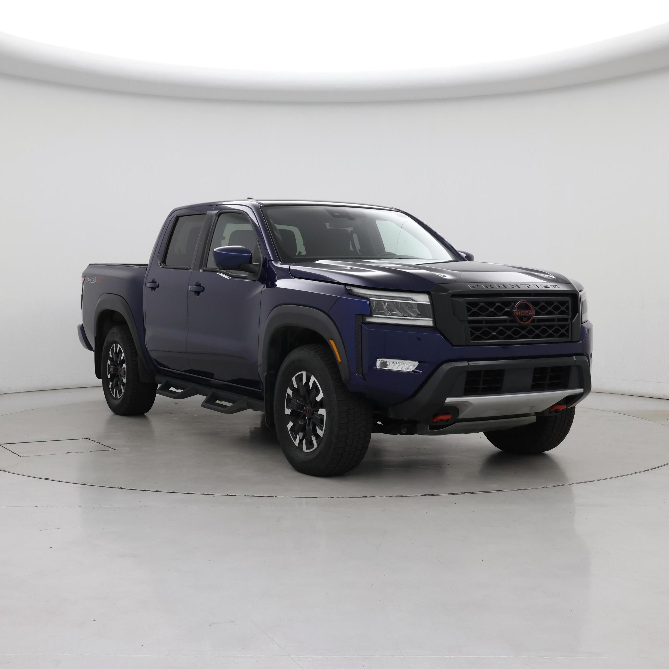 Blue 2023 Nissan Frontier Pickup Truck Four-Wheel Drive Automatic