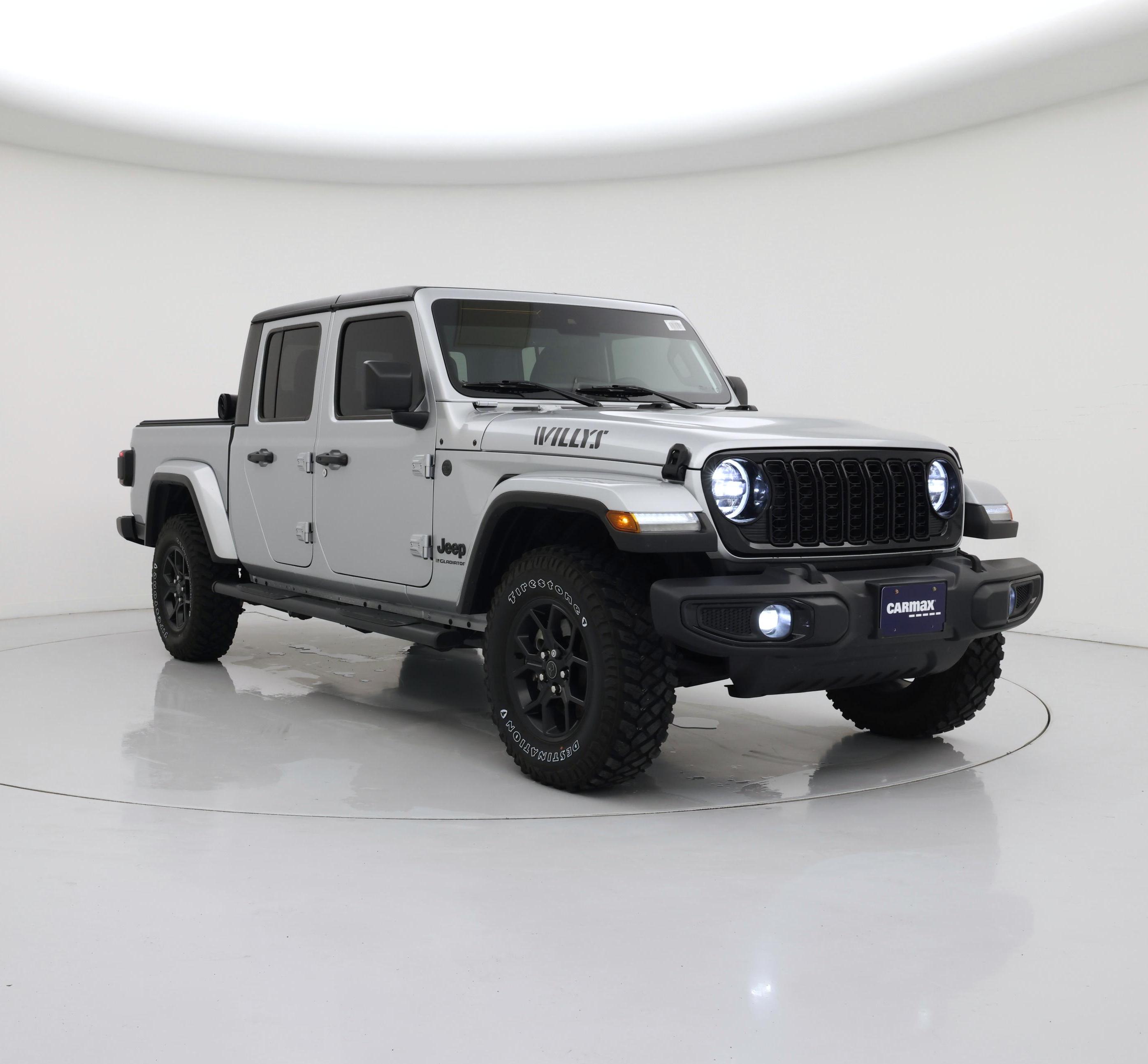 Silver 2024 Jeep Gladiator Pickup Truck Four-Wheel Drive Automatic