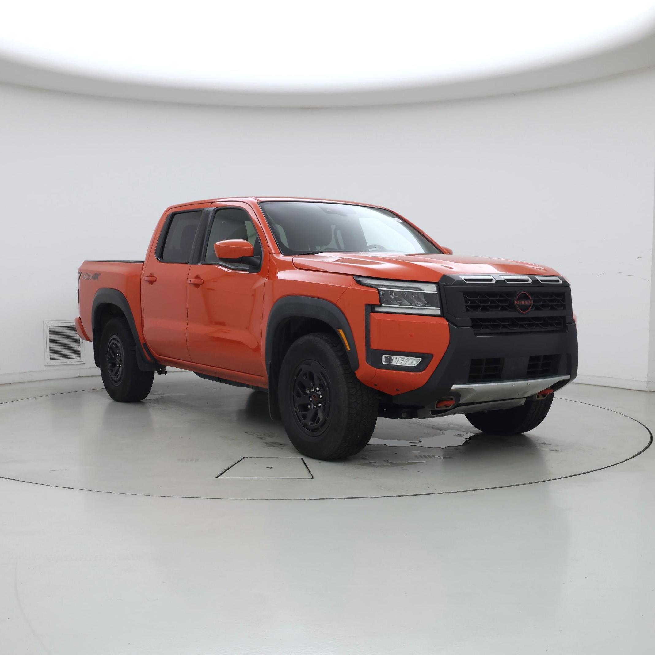 Orange 2025 Nissan Frontier Pickup Truck Four-Wheel Drive Automatic
