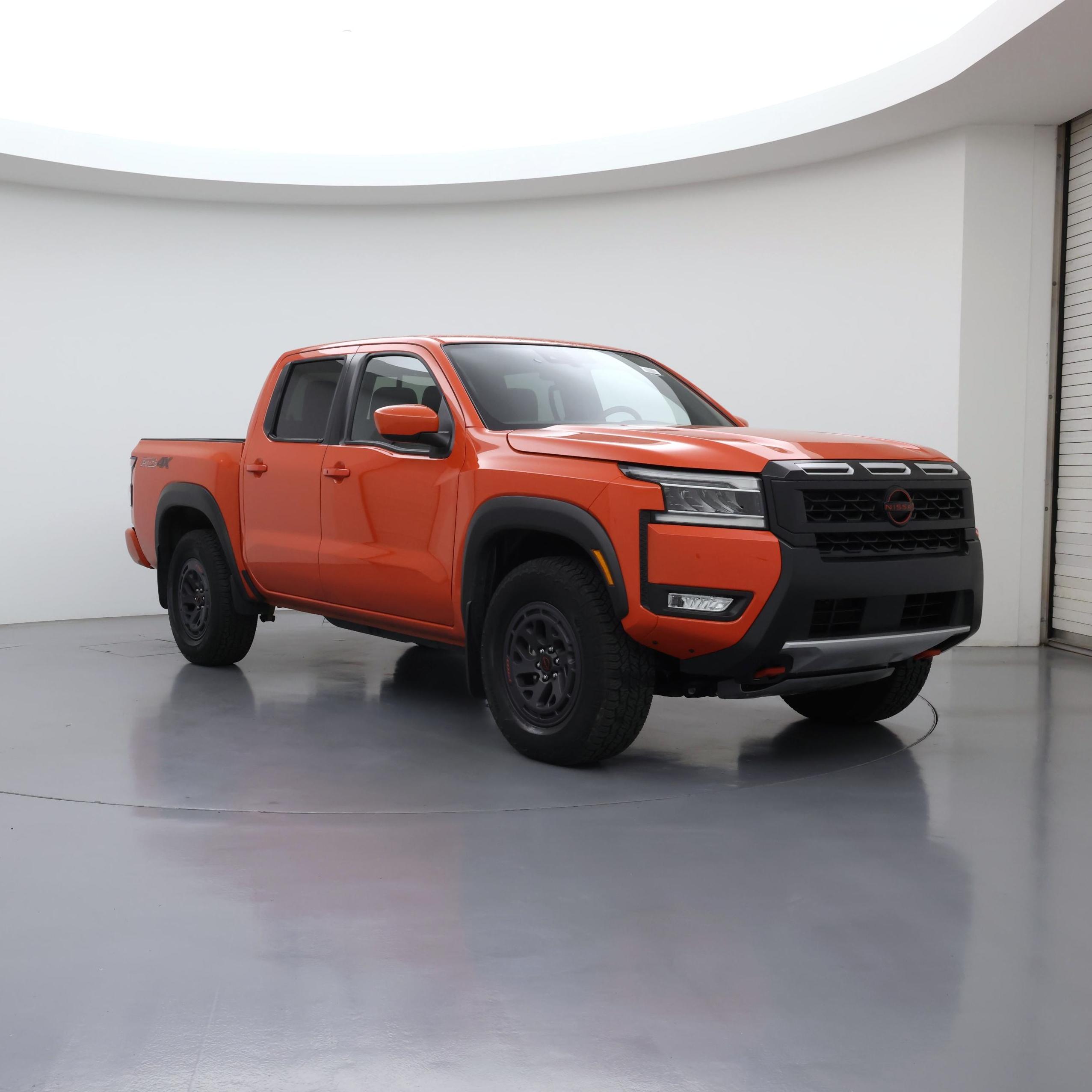 Orange 2025 Nissan Frontier Pickup Truck Four-Wheel Drive Automatic