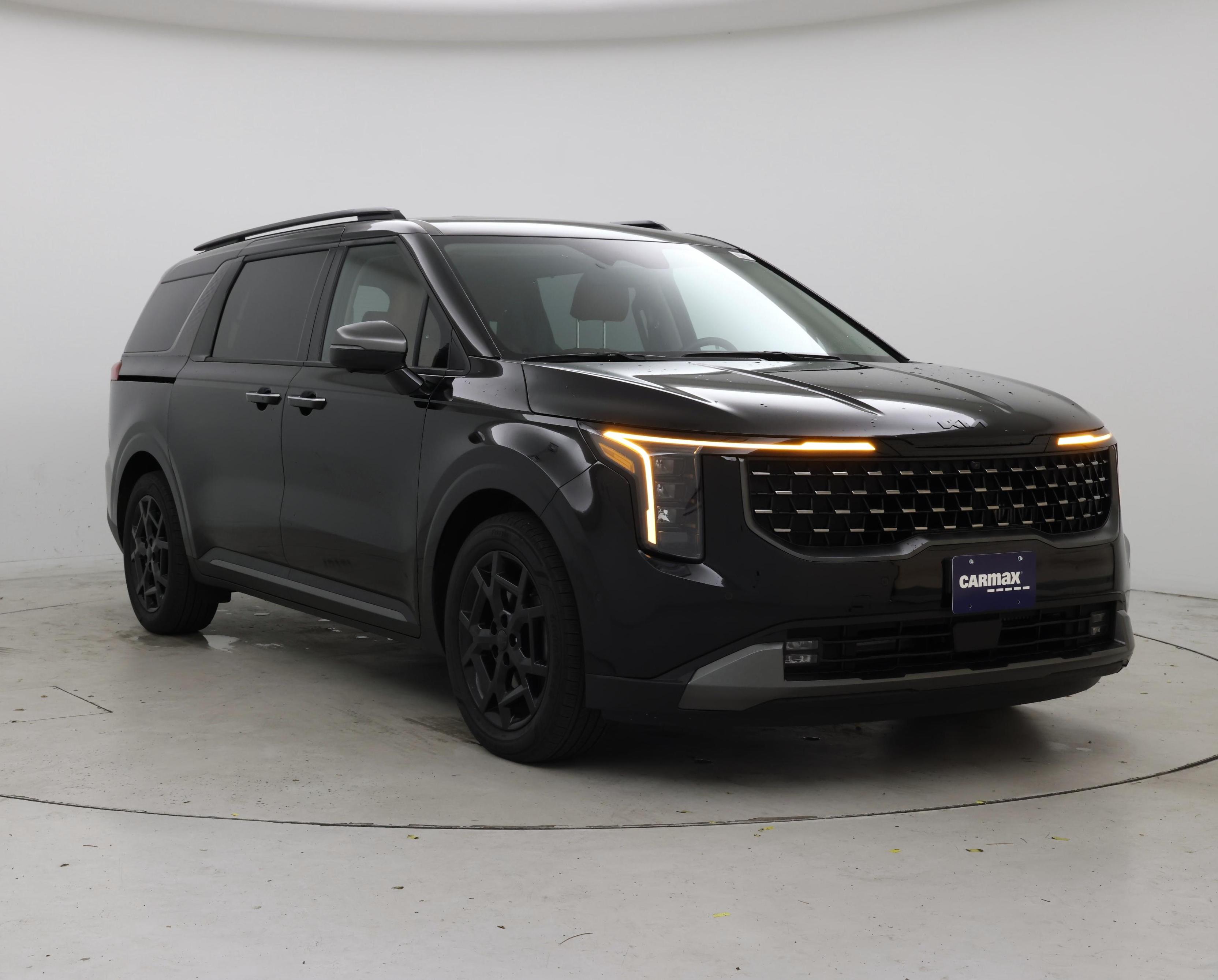 Black 2026 Kia Carnival Hybrid Minivan Front-Wheel Drive Automatic