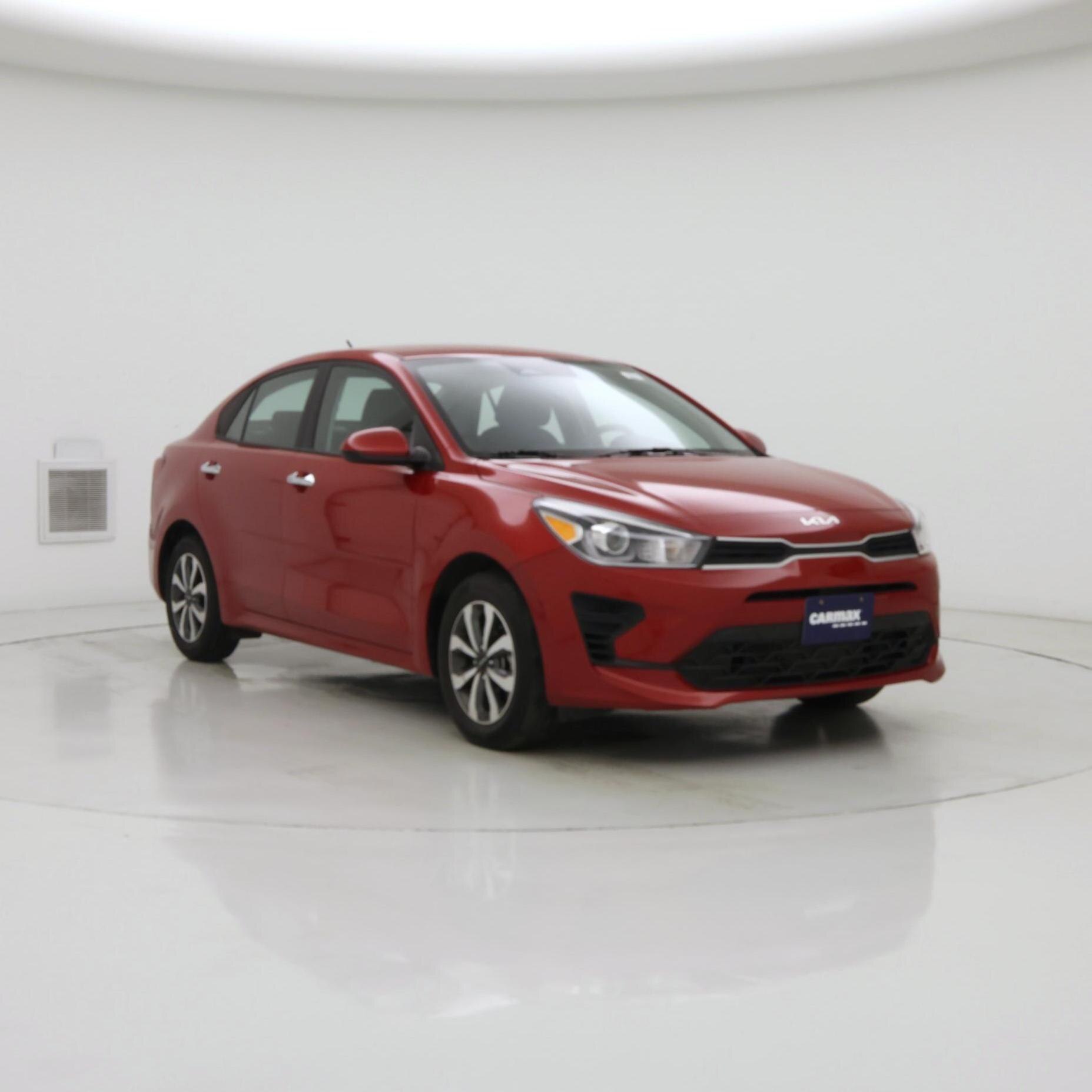 Red 2023 Kia Rio Sedan Front-Wheel Drive Automatic