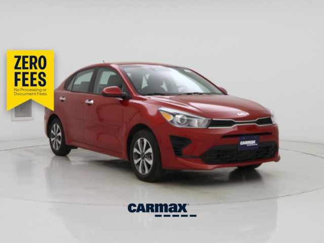 Red 2023 Kia Rio Sedan Front-Wheel Drive Automatic