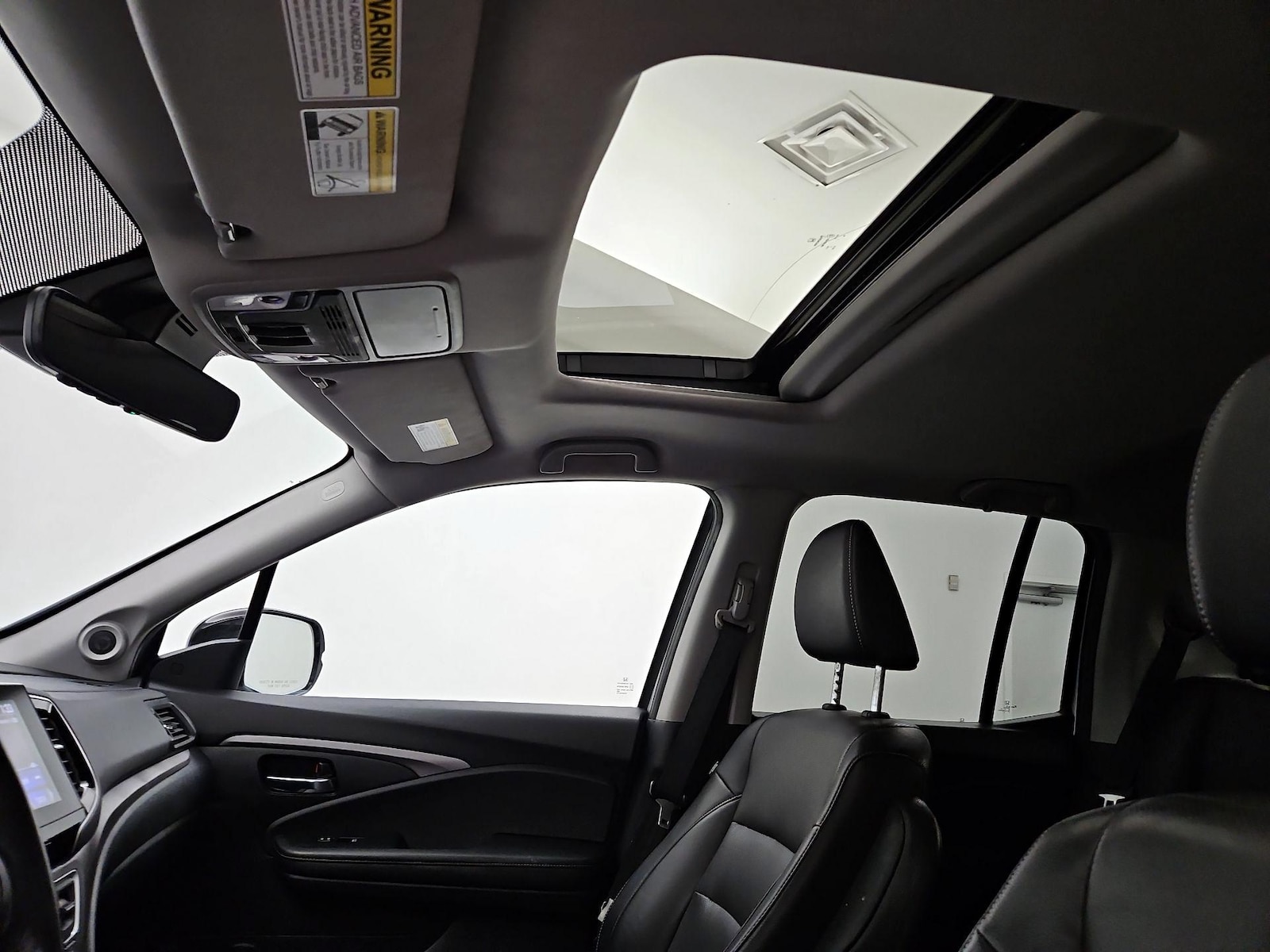 Sunroof(s) & Overhead Airbags
