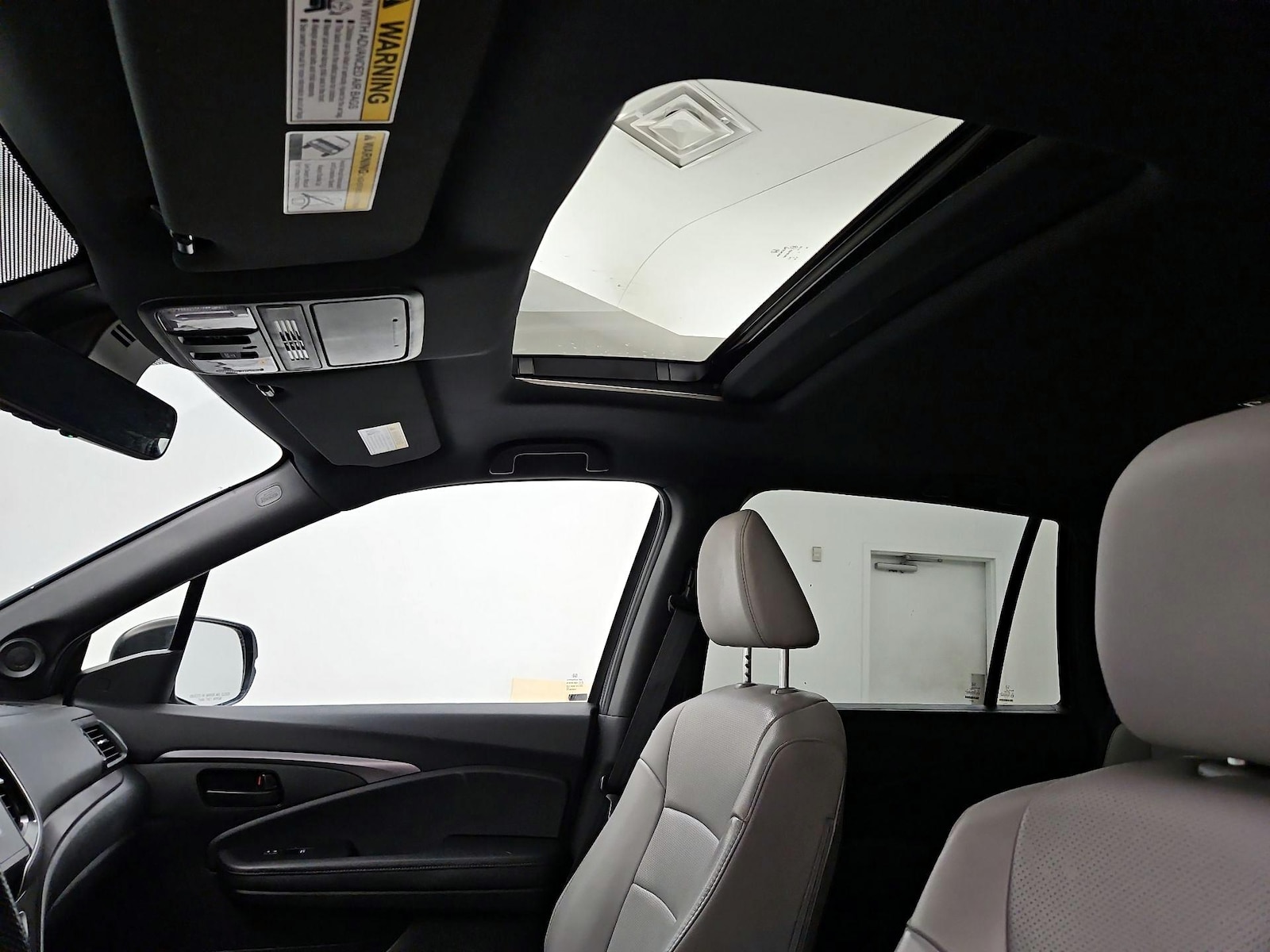 Sunroof(s) & Overhead Airbags