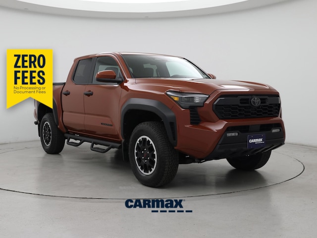 Orange 2025 Toyota Tacoma Pickup Truck Four-Wheel Drive Manual