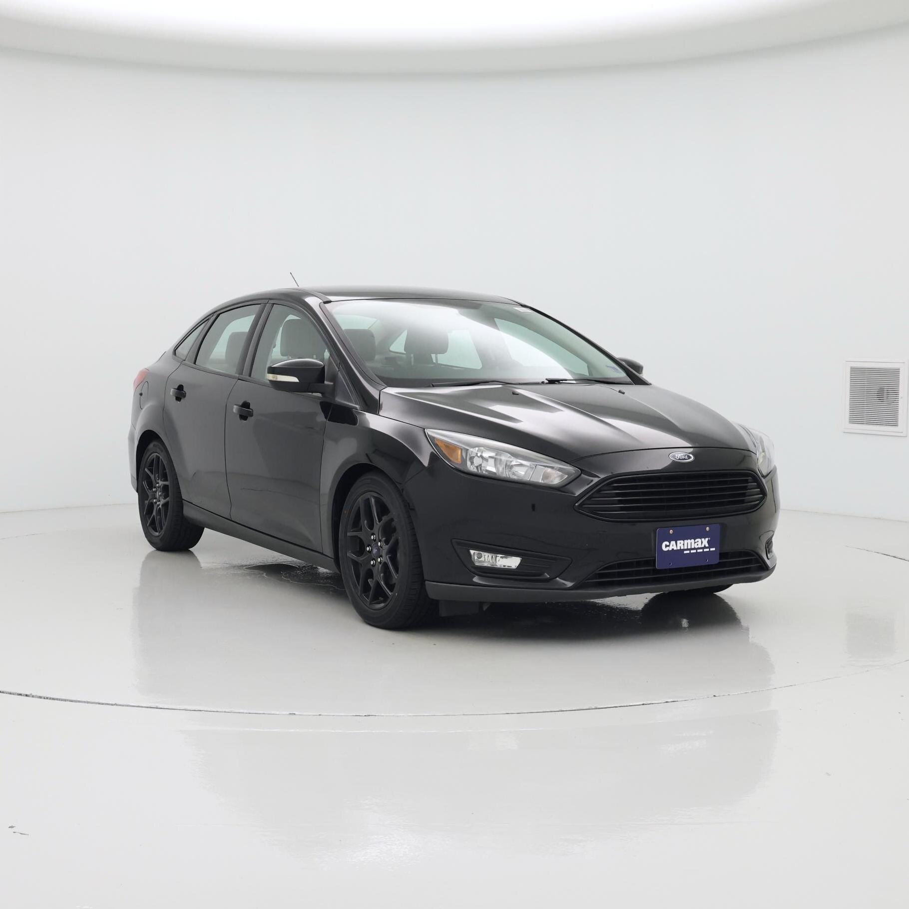 Black 2016 Ford Focus Sedan Front-Wheel Drive Automatic