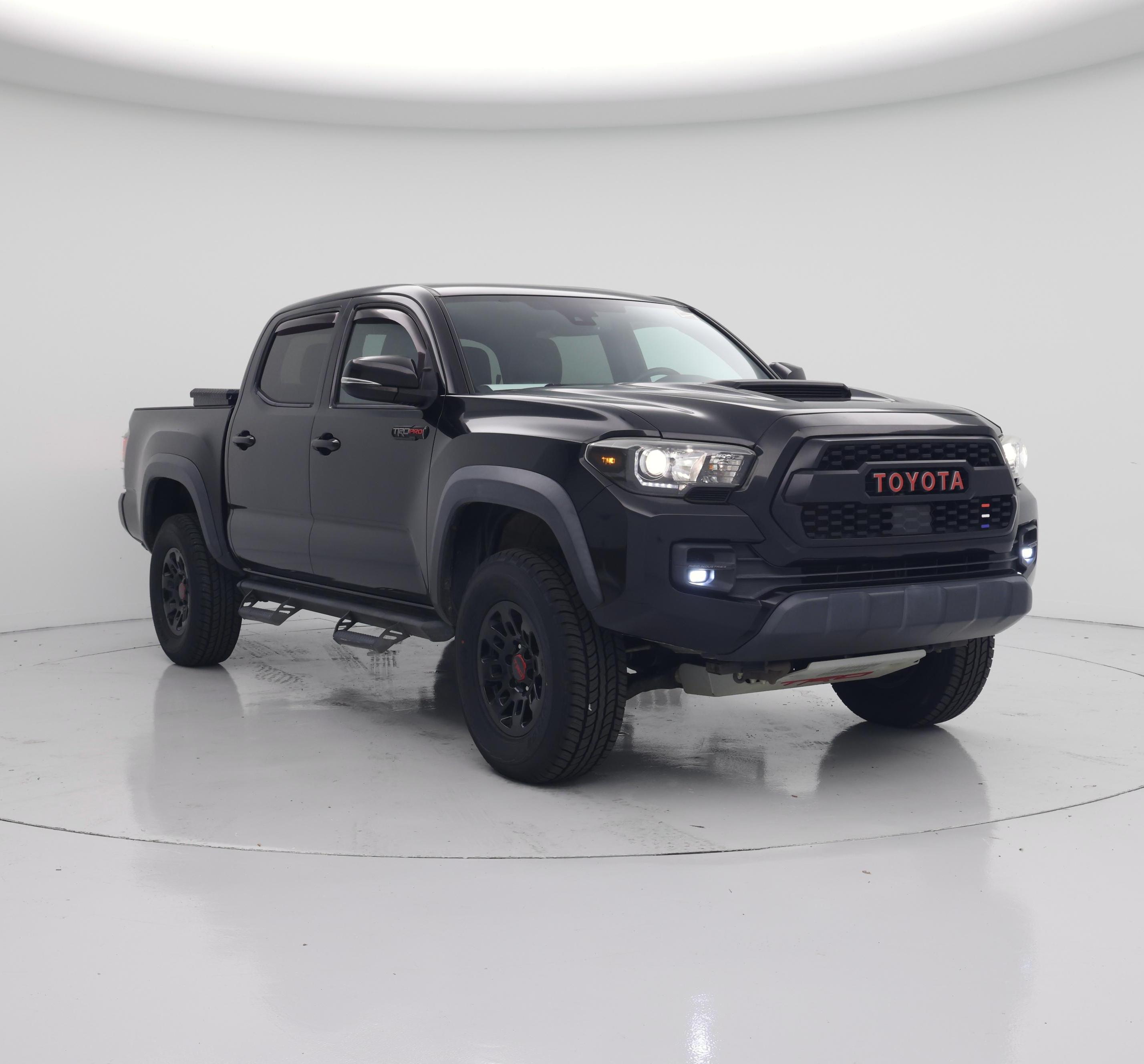 Black 2019 Toyota Tacoma Pickup Truck Four-Wheel Drive Manual