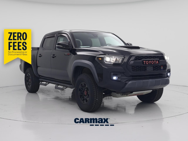 Black 2019 Toyota Tacoma Pickup Truck Four-Wheel Drive Manual
