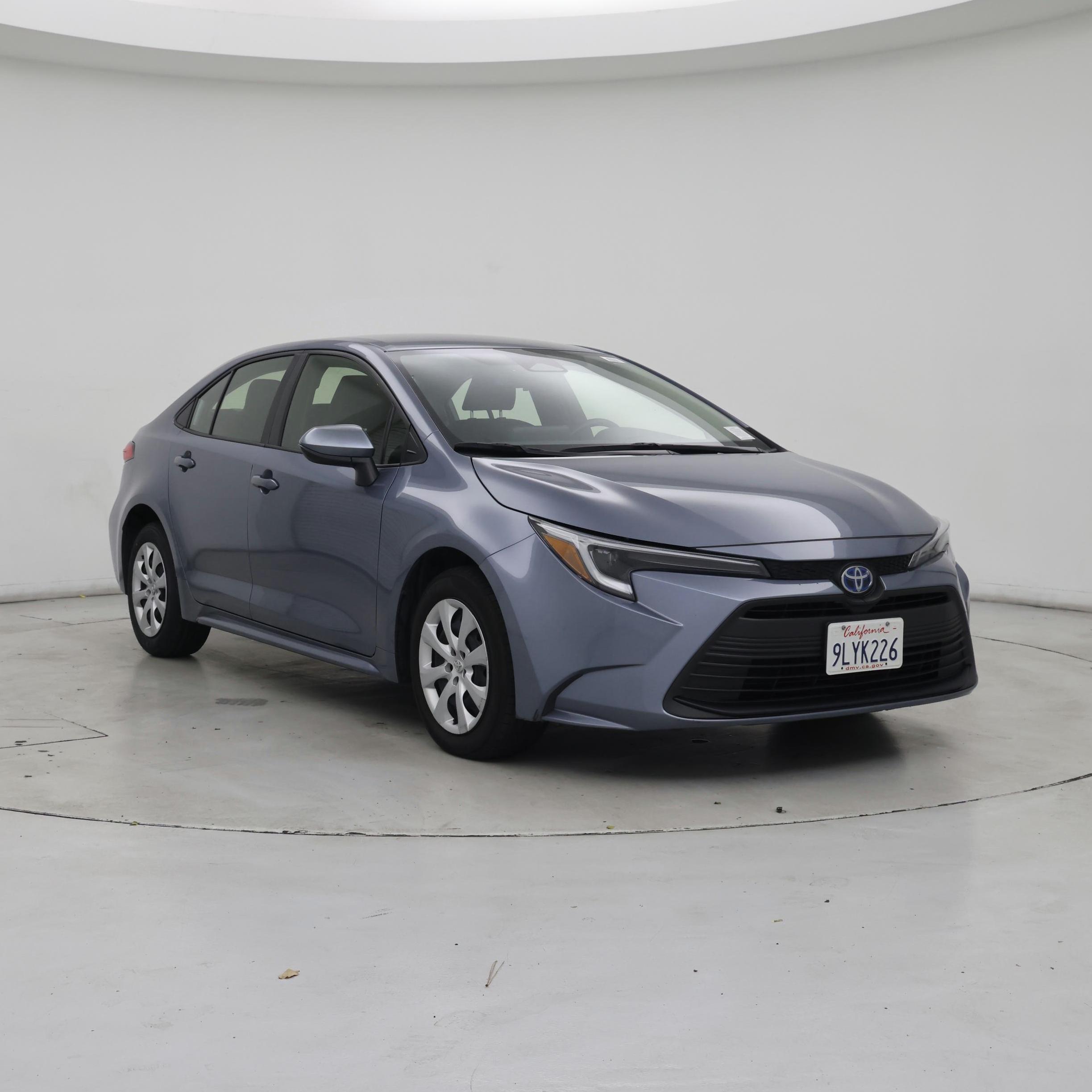 Blue 2024 Toyota Corolla Hybrid LE FWD Sedan Front-Wheel Drive Automatic