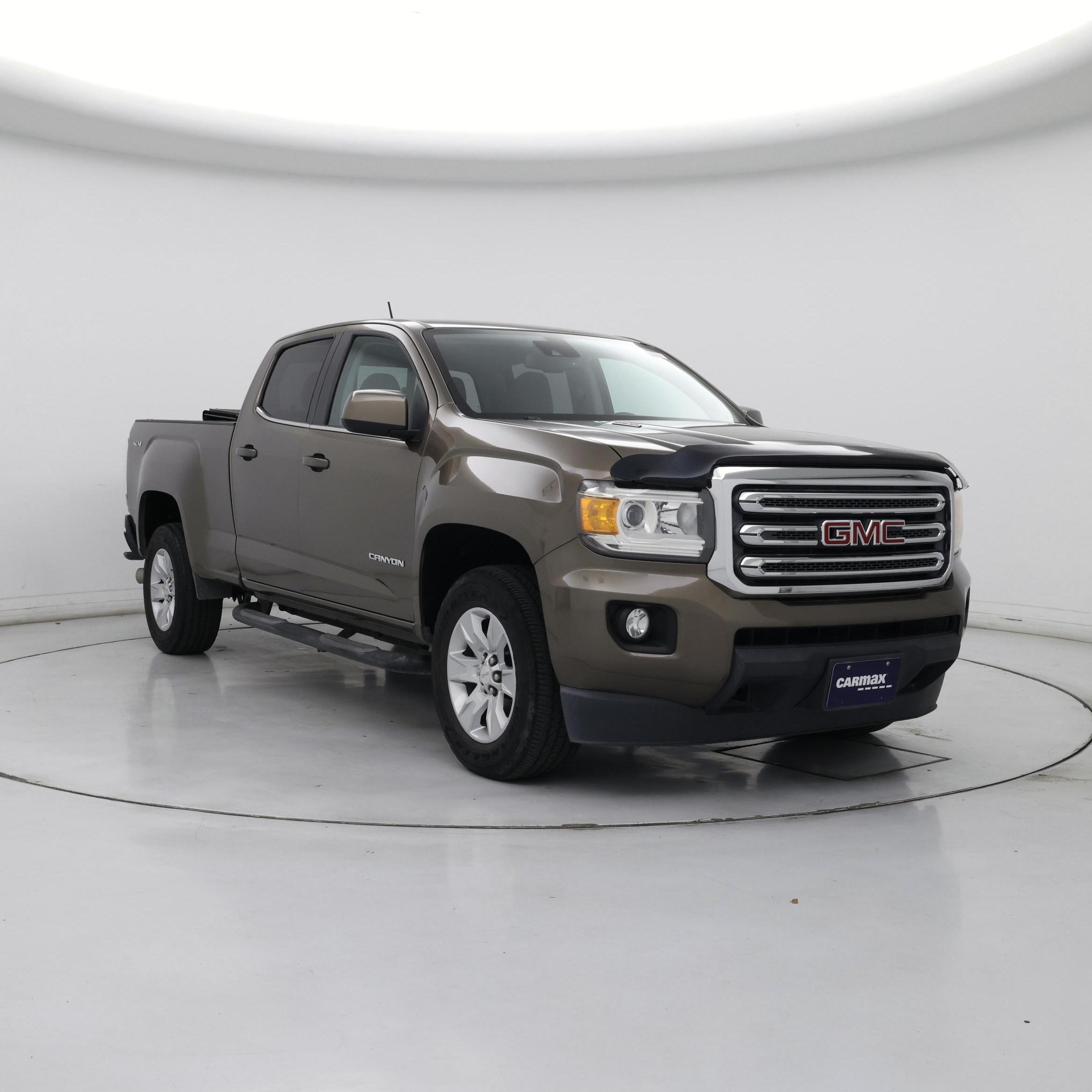 Brown (Tan) 2016 GMC Canyon Pickup Truck Four-Wheel Drive Automatic