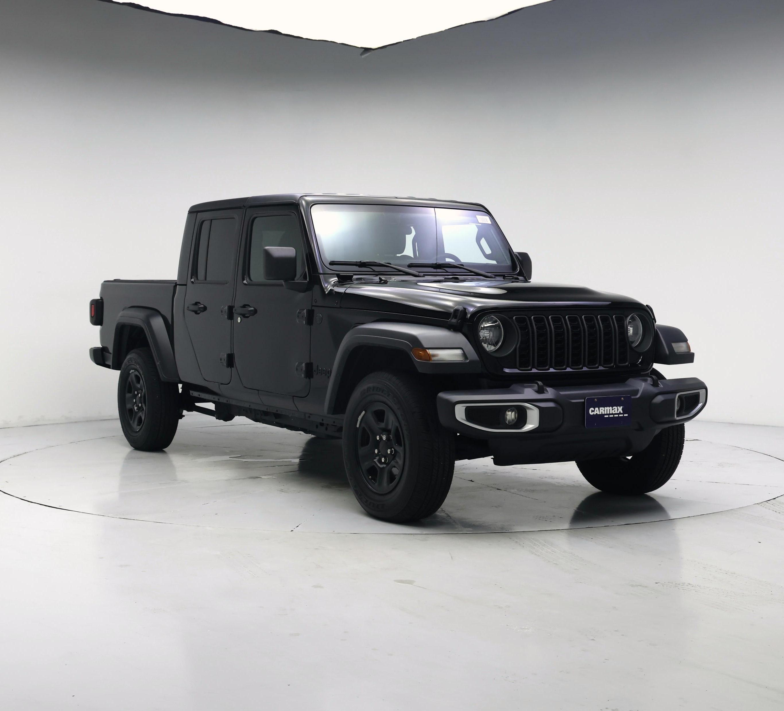 Black 2024 Jeep Gladiator Pickup Truck Four-Wheel Drive Manual