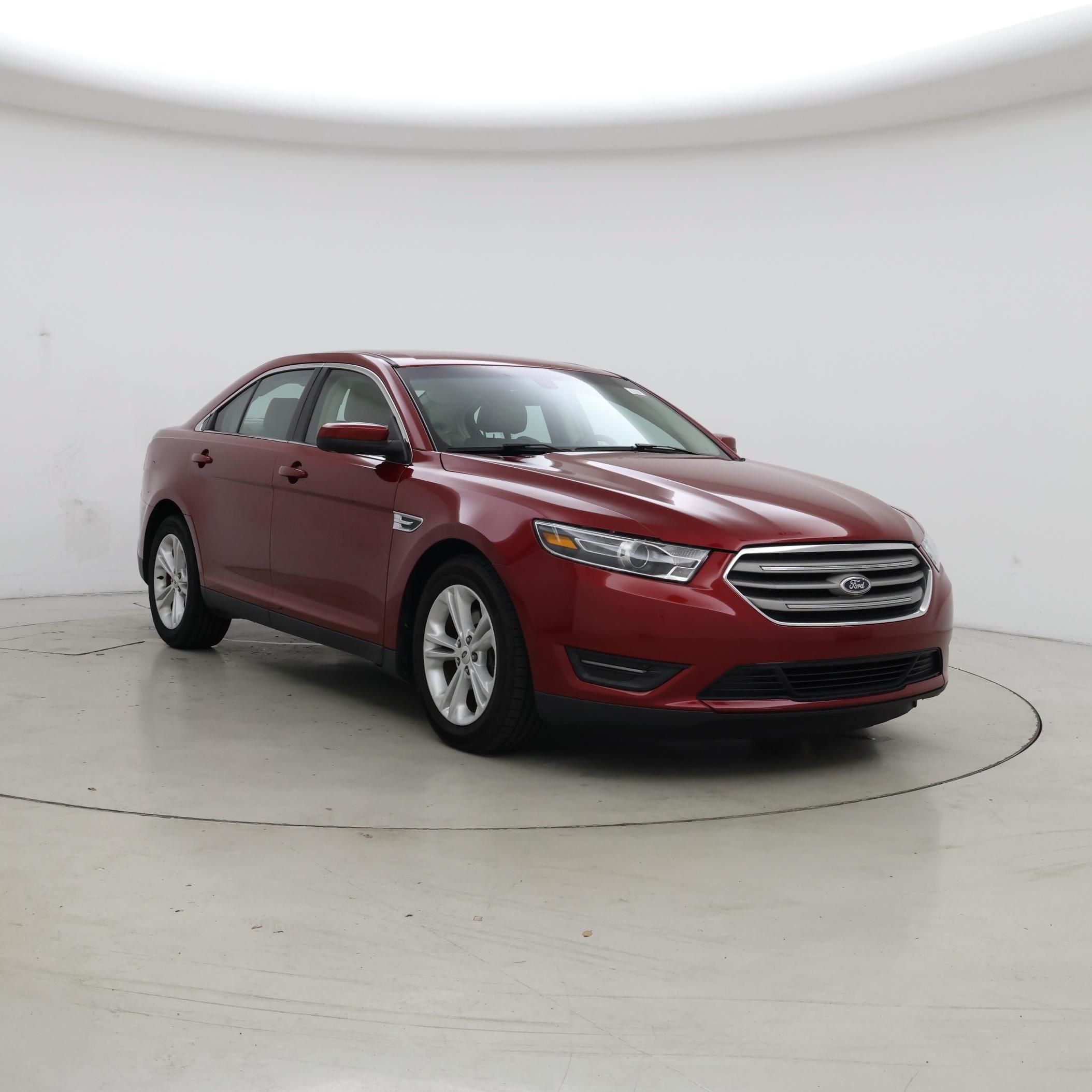 Red 2016 Ford Taurus Sedan Front-Wheel Drive Automatic