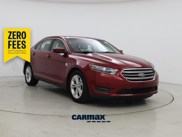 Red 2016 Ford Taurus Sedan Front-Wheel Drive Automatic