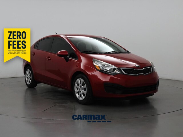 Red 2015 Kia Rio Sedan Front-Wheel Drive Automatic