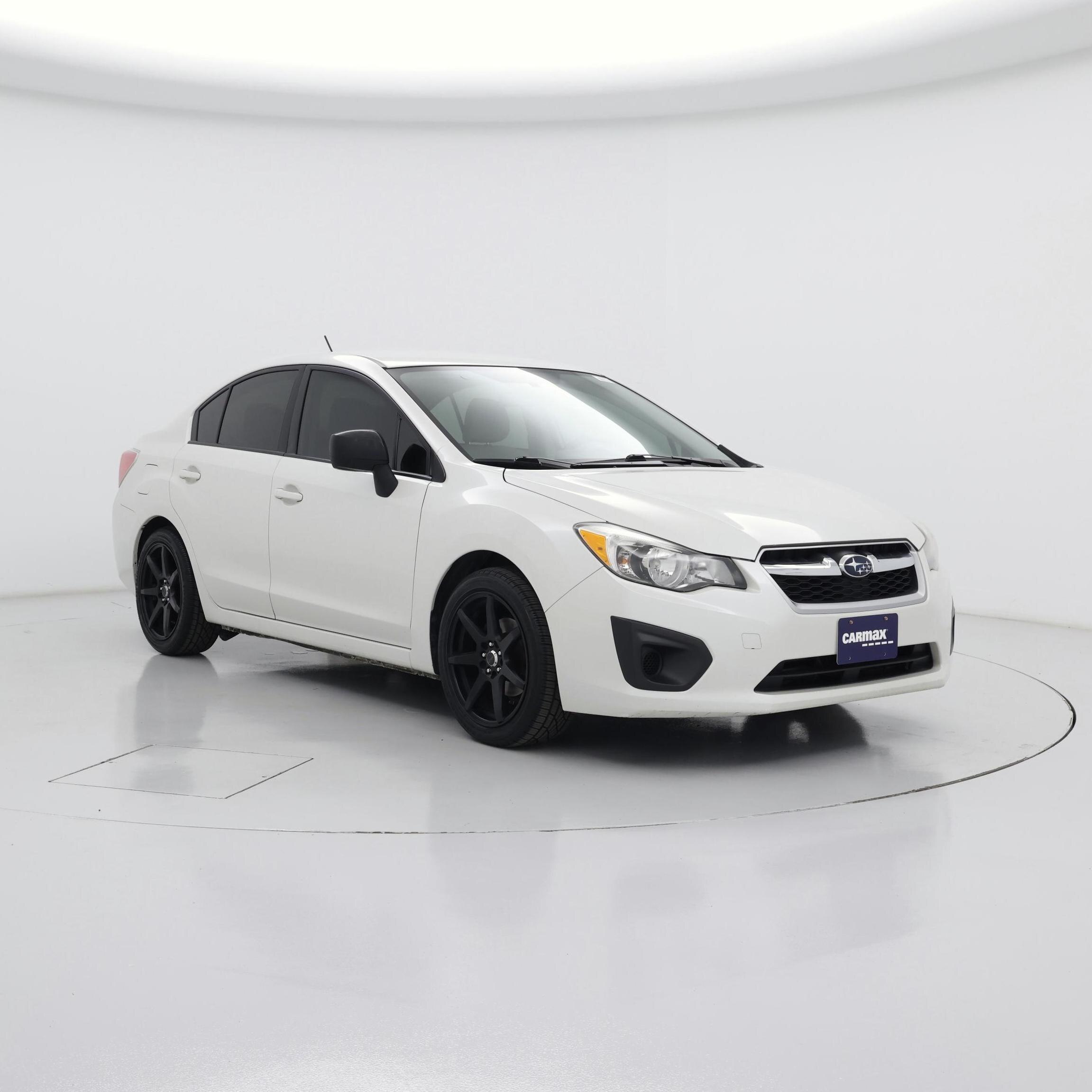 White 2014 Subaru Impreza Sedan All-Wheel Drive Manual