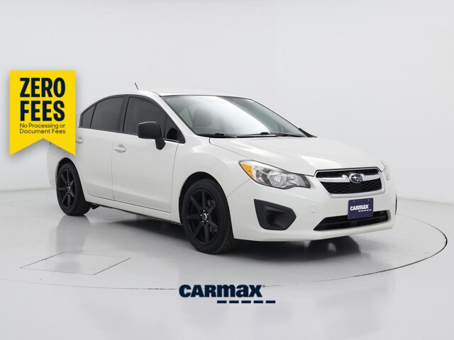 White 2014 Subaru Impreza Sedan All-Wheel Drive Manual