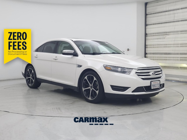White 2015 Ford Taurus Sedan Front-Wheel Drive Automatic