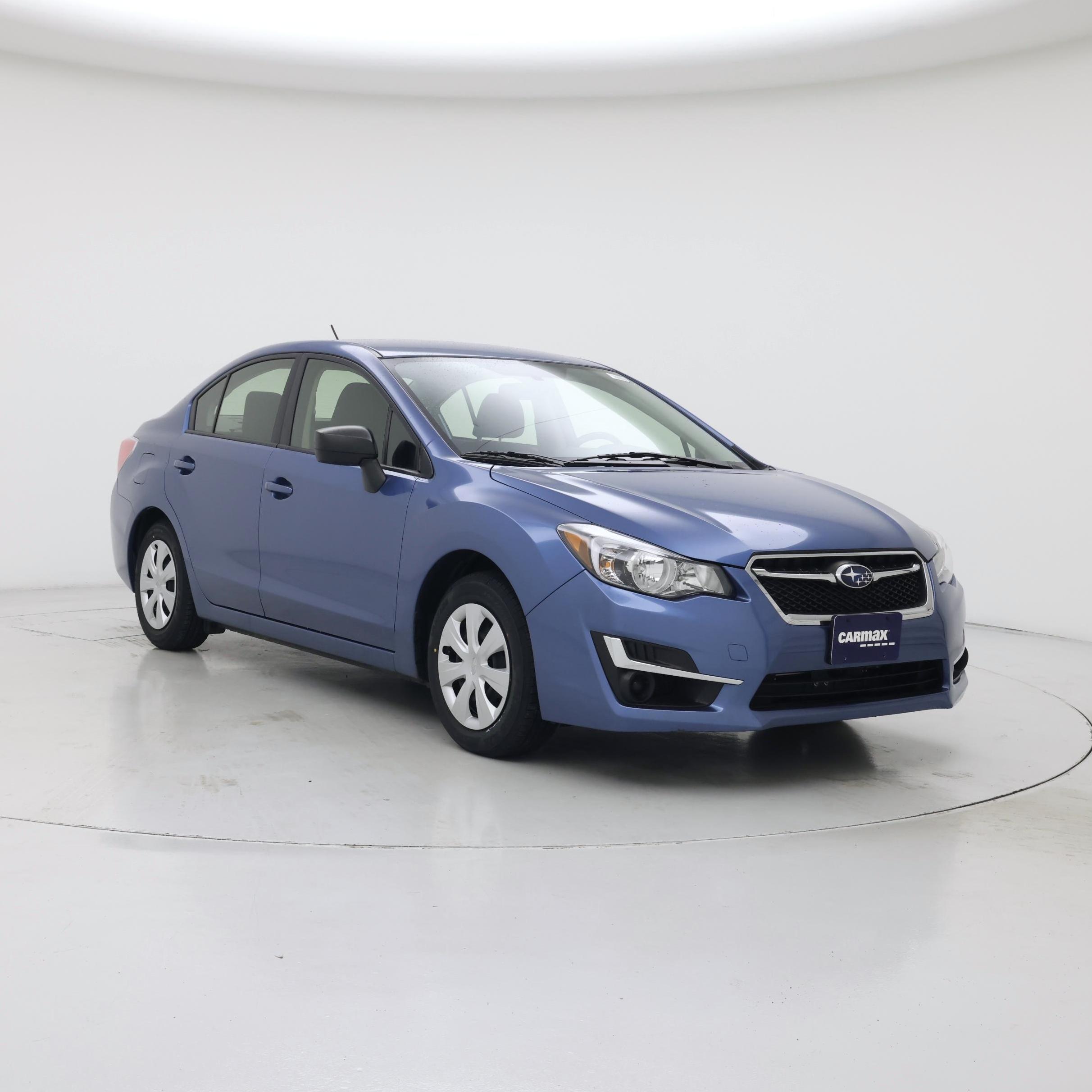Blue 2016 Subaru Impreza Sedan All-Wheel Drive Manual
