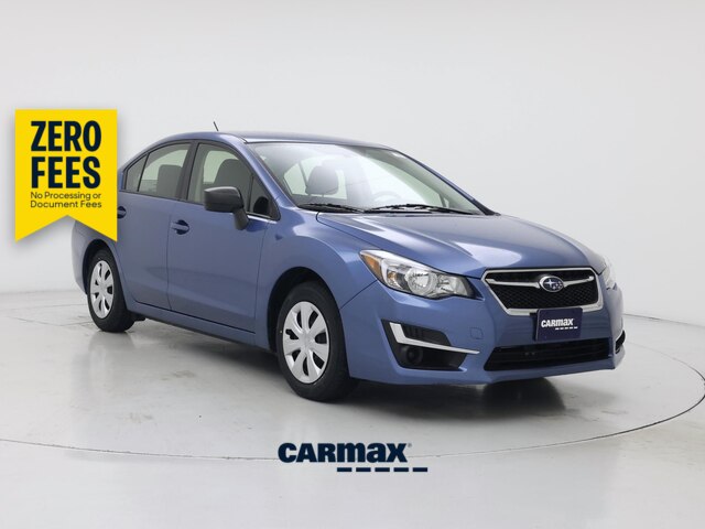 Blue 2016 Subaru Impreza Sedan All-Wheel Drive Manual