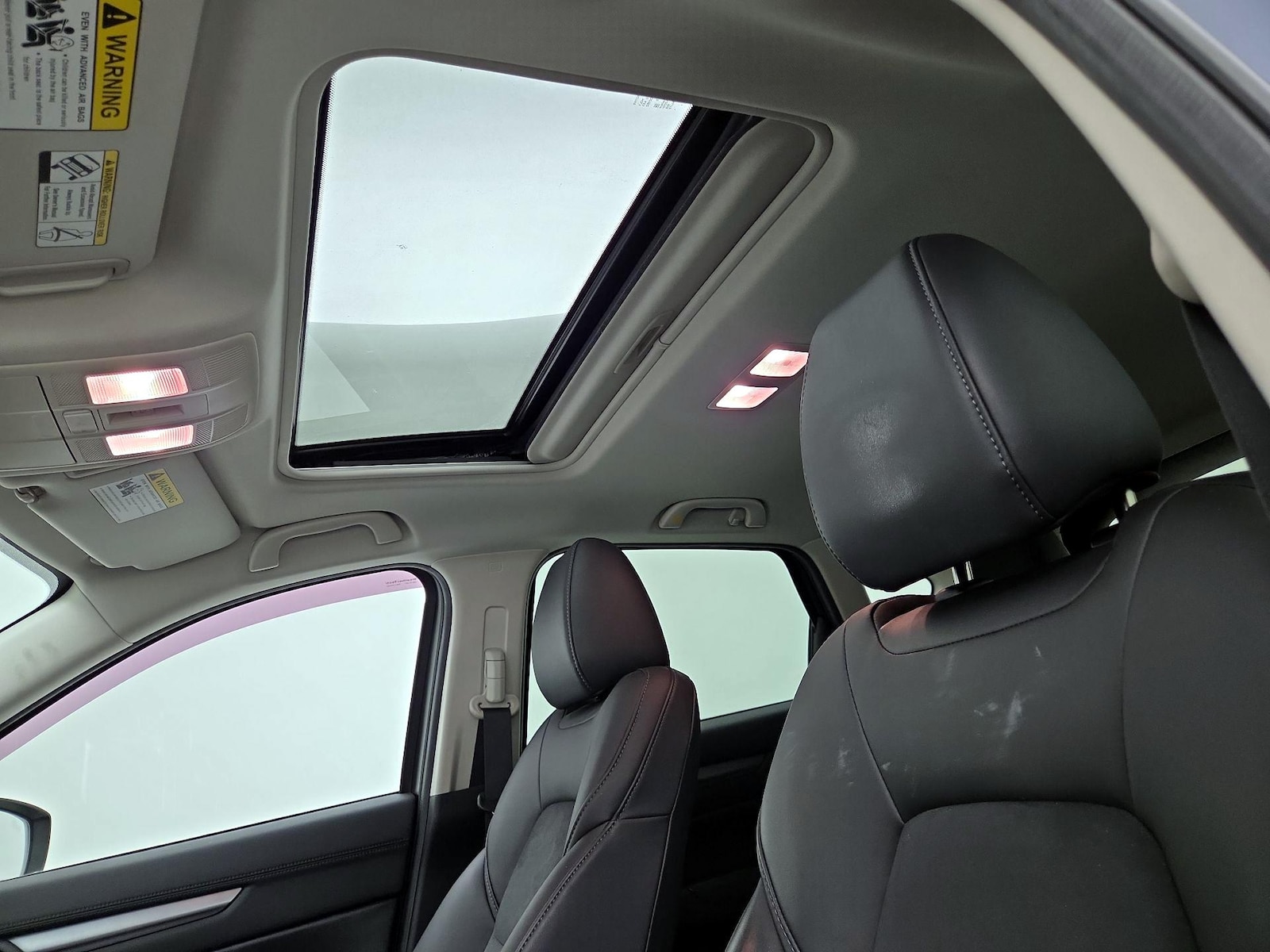 Sunroof(s) & Overhead Airbags