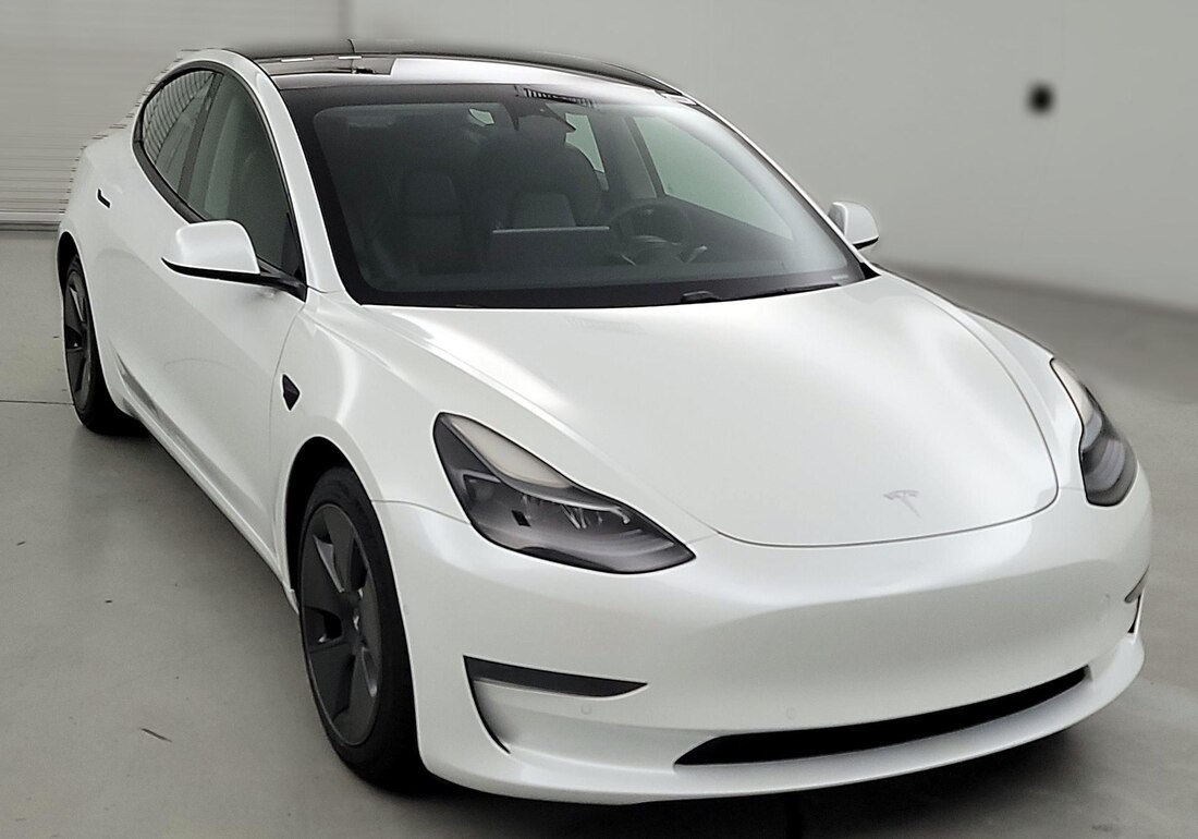 2021 Tesla Model 3 Standard Range Plus in White — CarMax photo